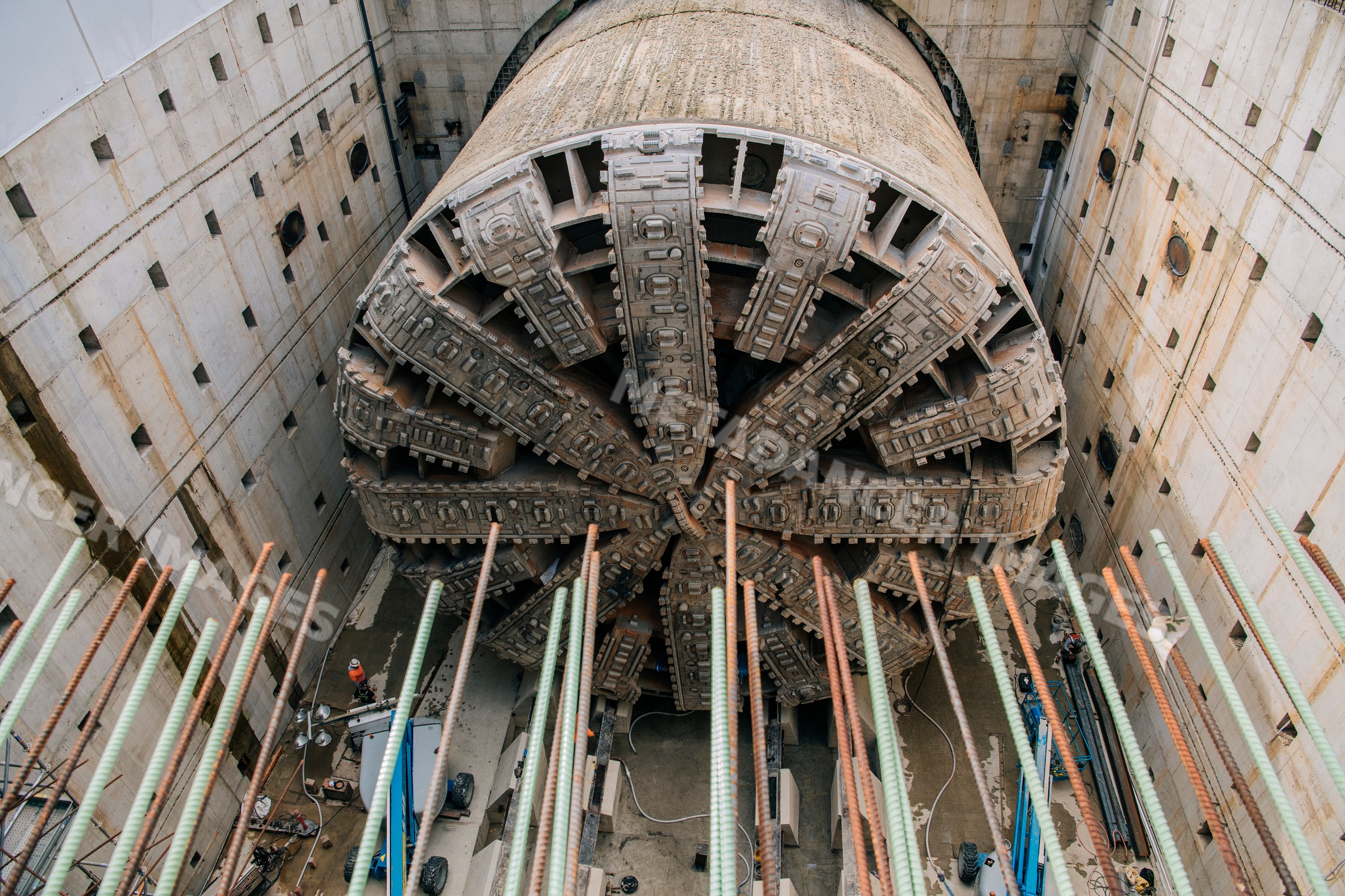 A tunnel boring machine drilling underground in a construction site