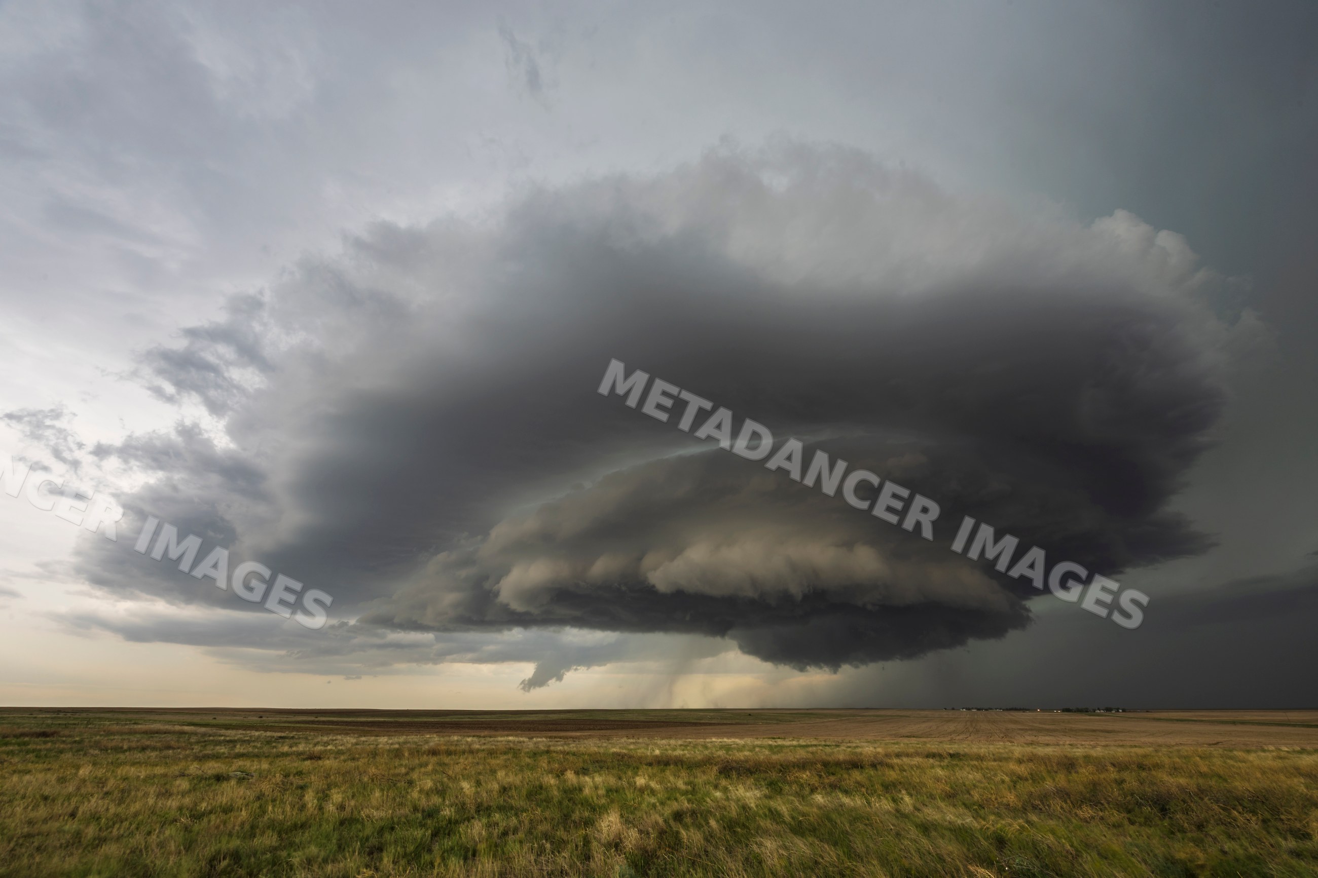 Mesocyclone storm forming over grassland plains