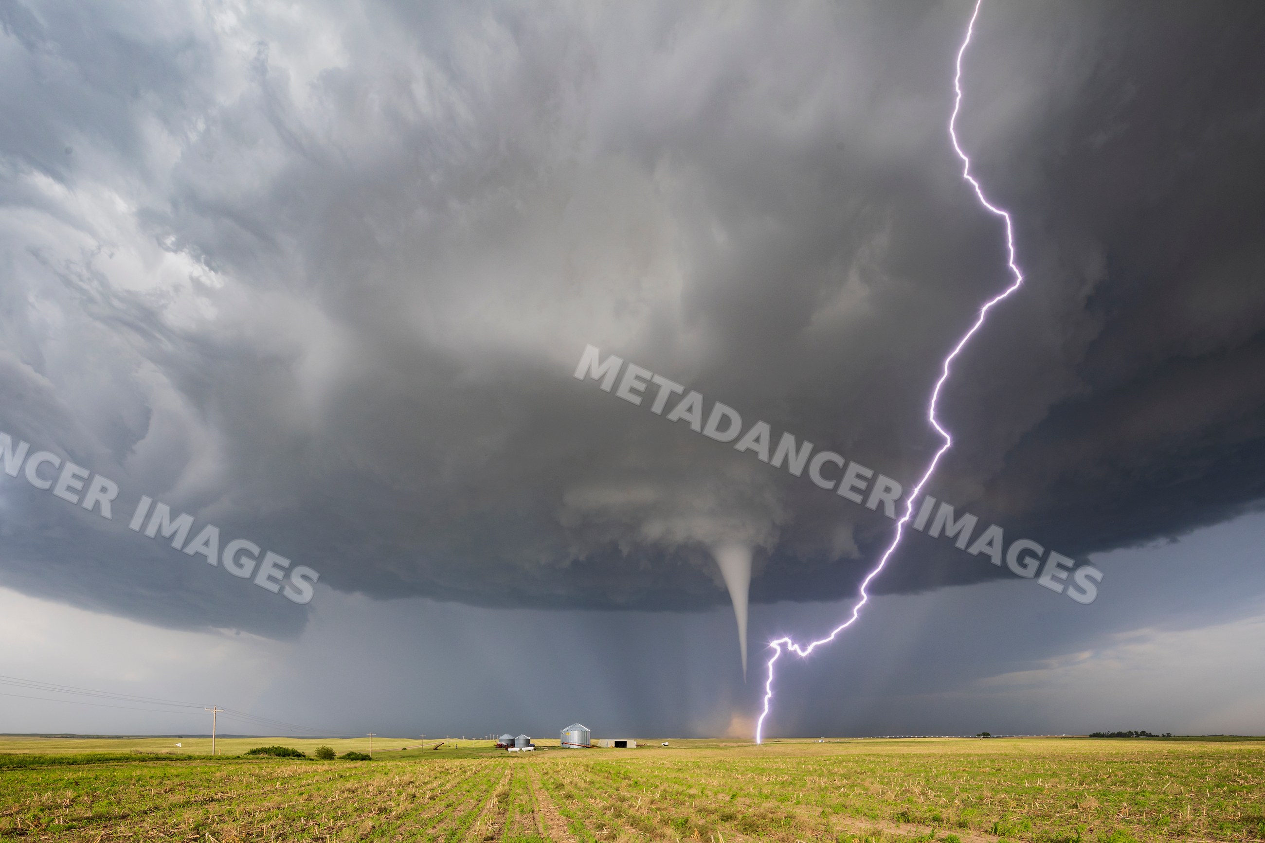 Tornado with Cloud-to-ground Lightning near dickens, nebraska, USA