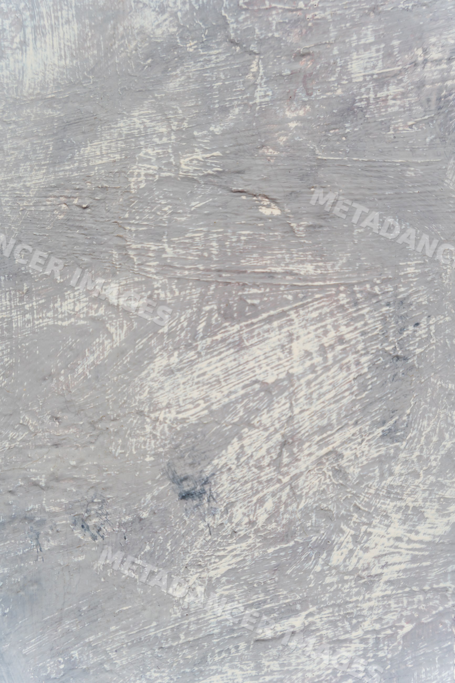 Abstract gray textured surface with scratched paint marks