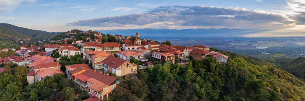 Town of Sighnaghi with Caucasus Mountains at Sunrise in Georgia