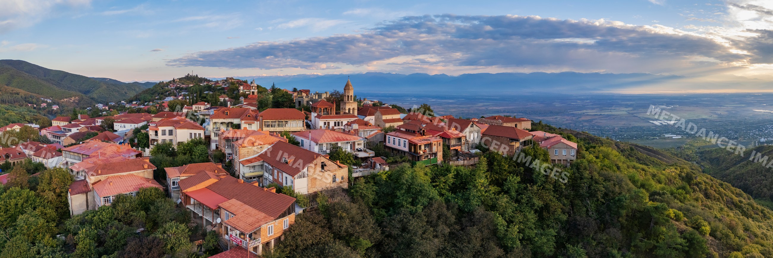 Town of Sighnaghi with Caucasus Mountains at Sunrise in Georgia