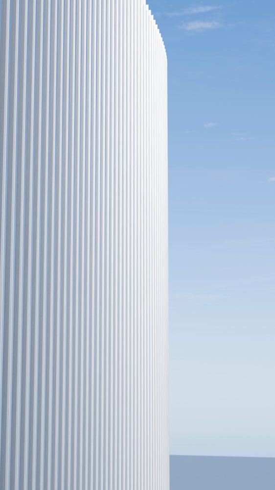White modern building with vertical-lined facade under blue sky