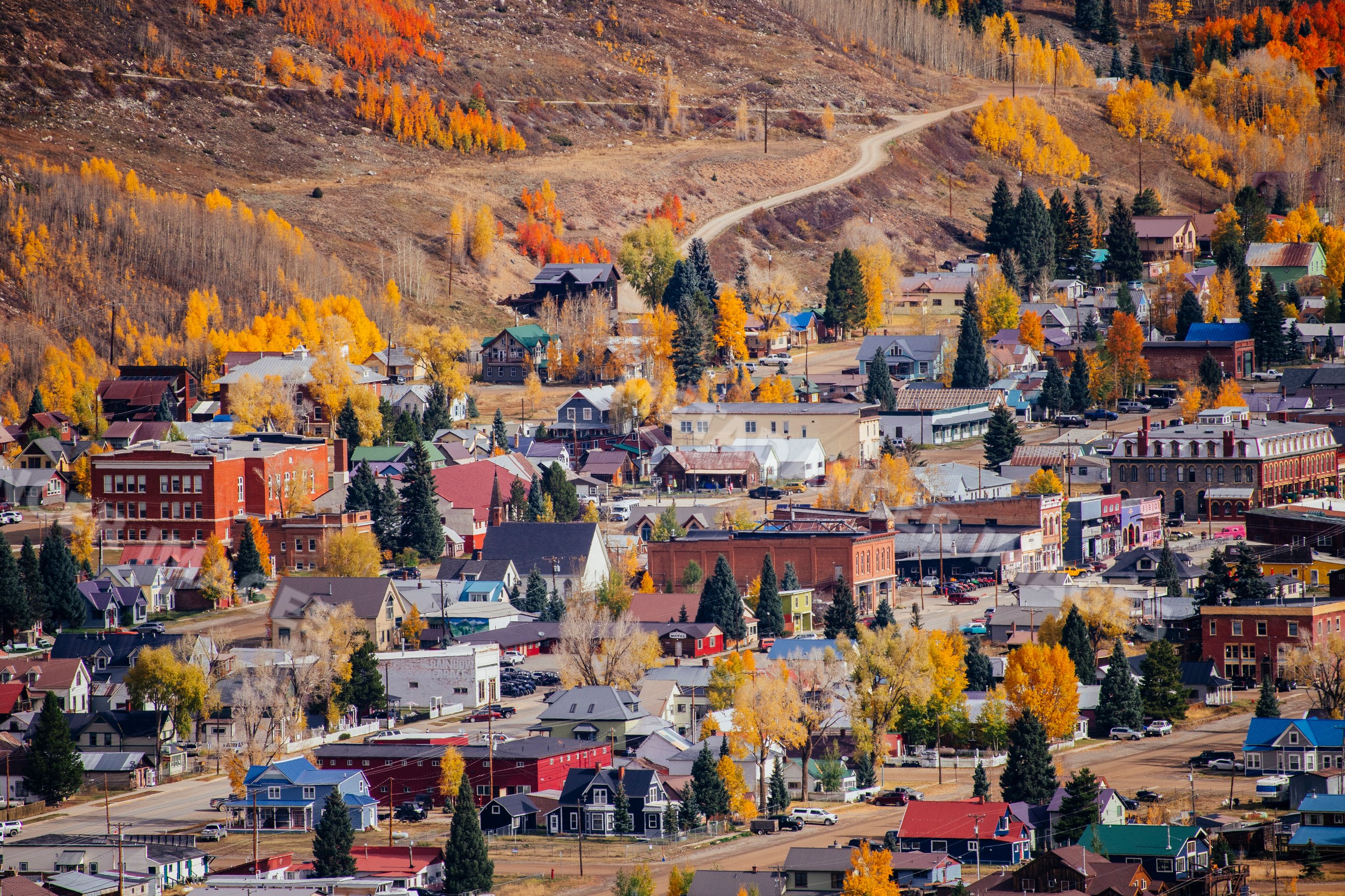 Mountain town with fall colors and hillside road in Durango Colorado