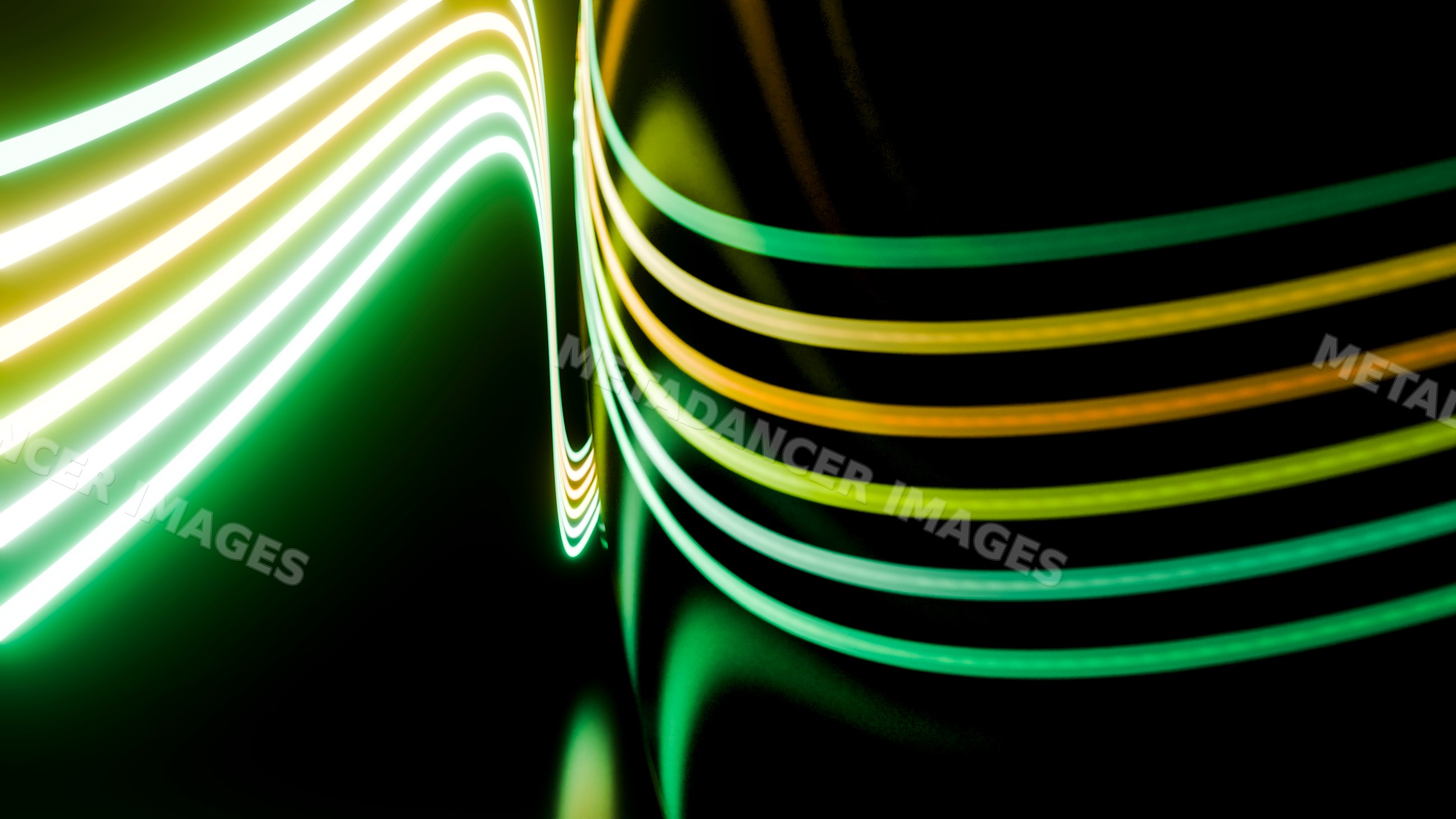 Abstract curved green and yellow light trails on dark background