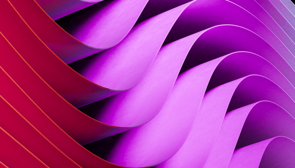Abstract illustration of curved folded paper in magenta