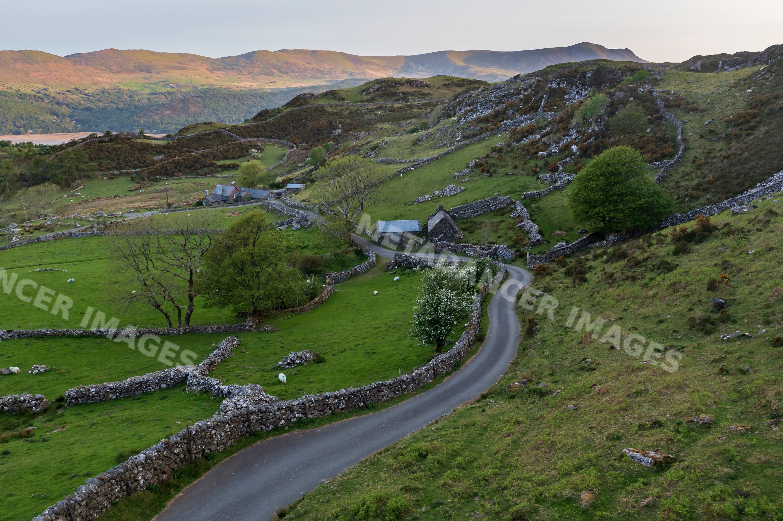 Stone Walls and winding road in the welsh countryside