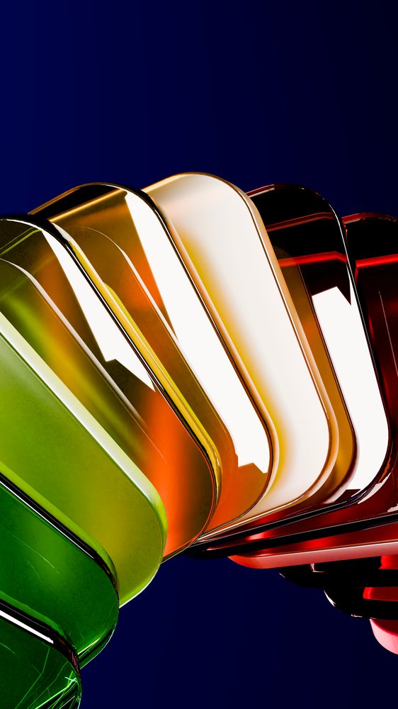 Stacked colored transparent glasses with reflections