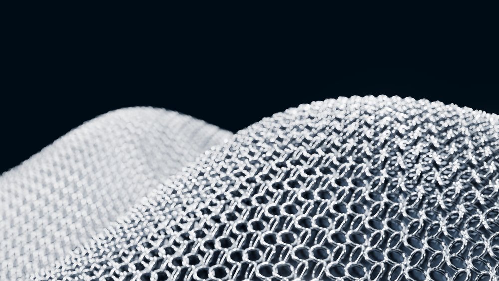 Interlocking metal chainmail armor pattern close-up