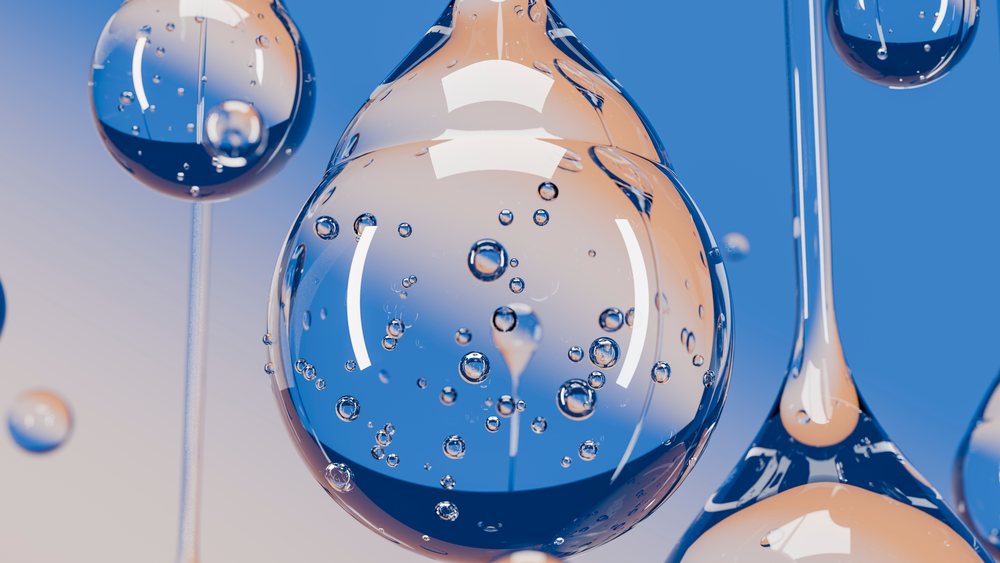 Transparent liquid droplets with bubbles and reflections
