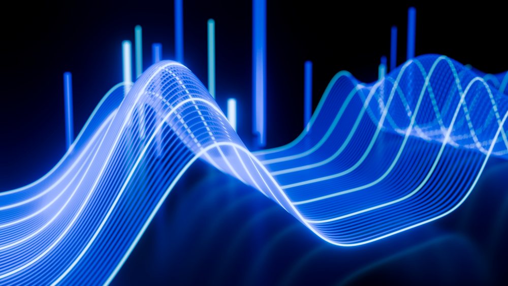 Abstract 3d glowing blue wave of light lines on dark background