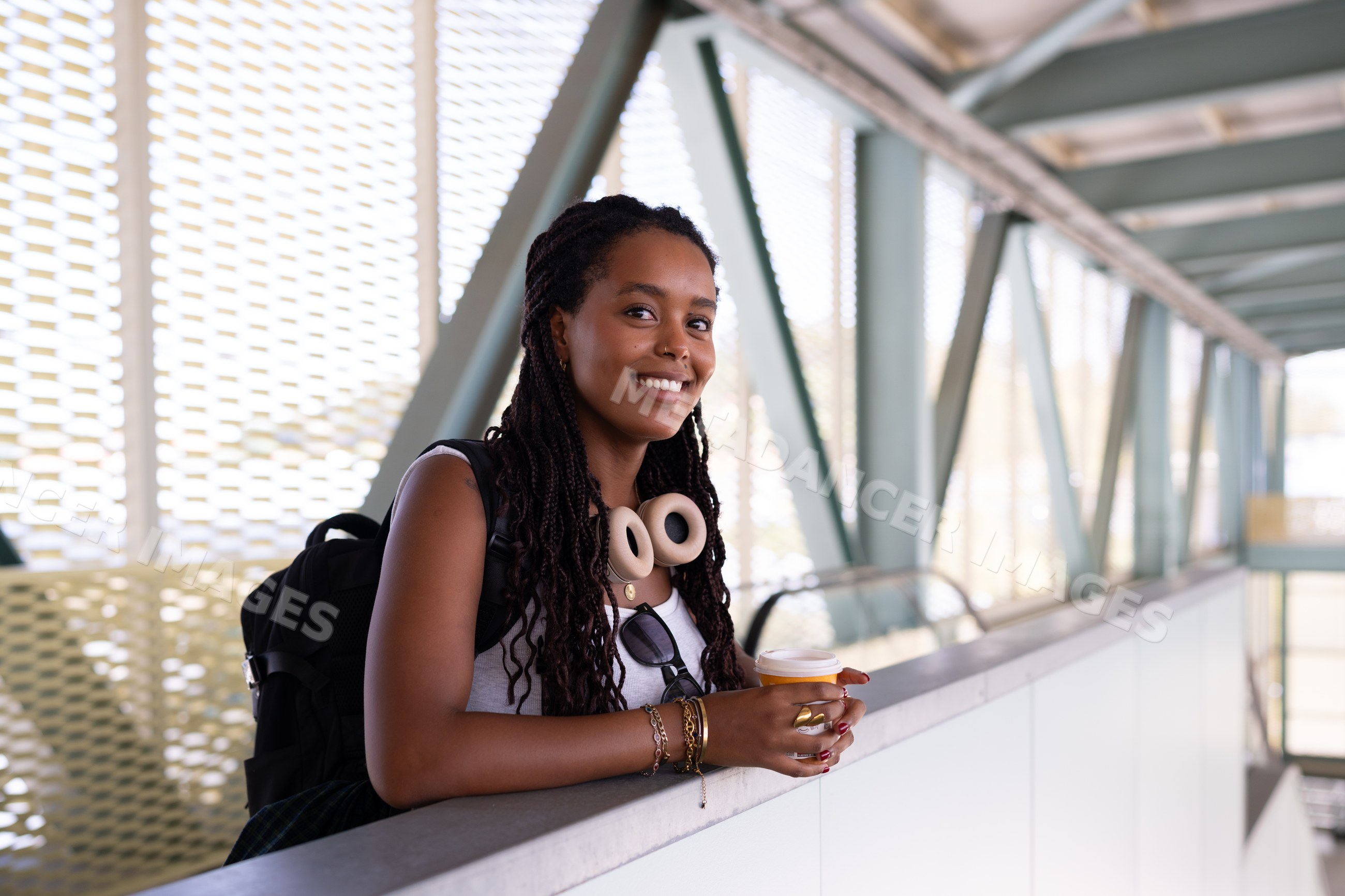 Young African American woman enjoying coffee