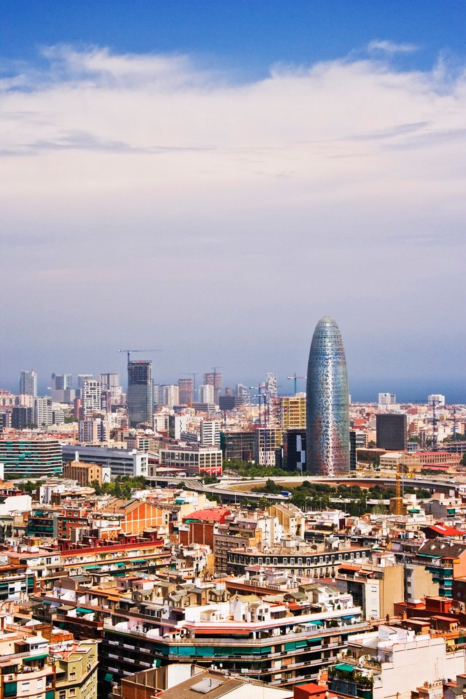 Cityscape of barcelona with torre glòries skyscraper and urban