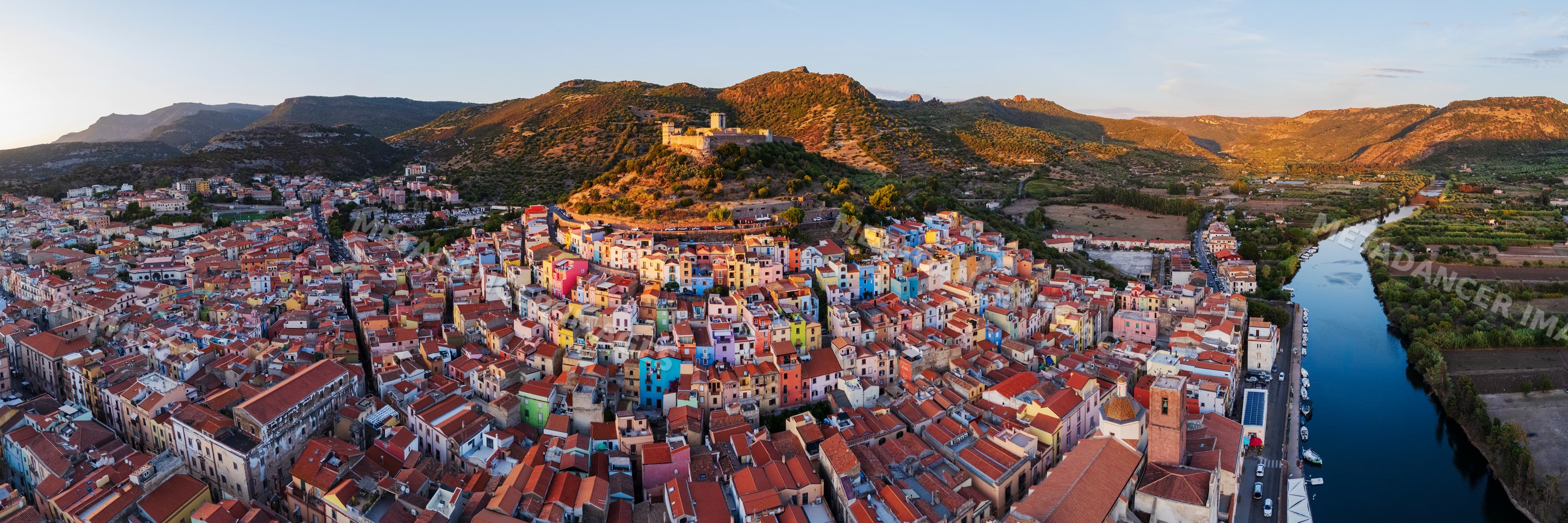 Bosa Old Town canyon and castle at Sunset in Sardinia Italy