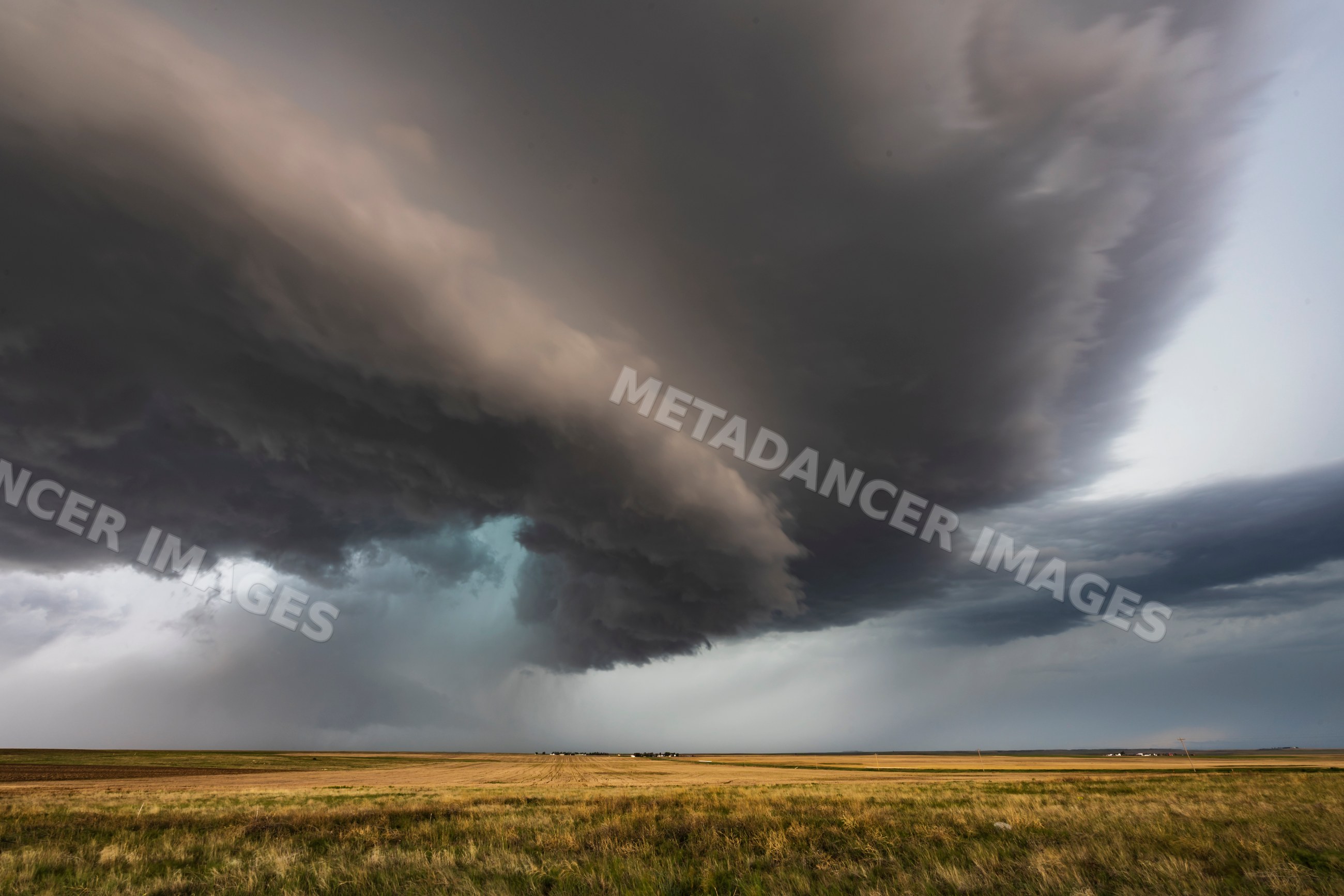 Tornado-warned Supercell storm over grassland in merino, colorado