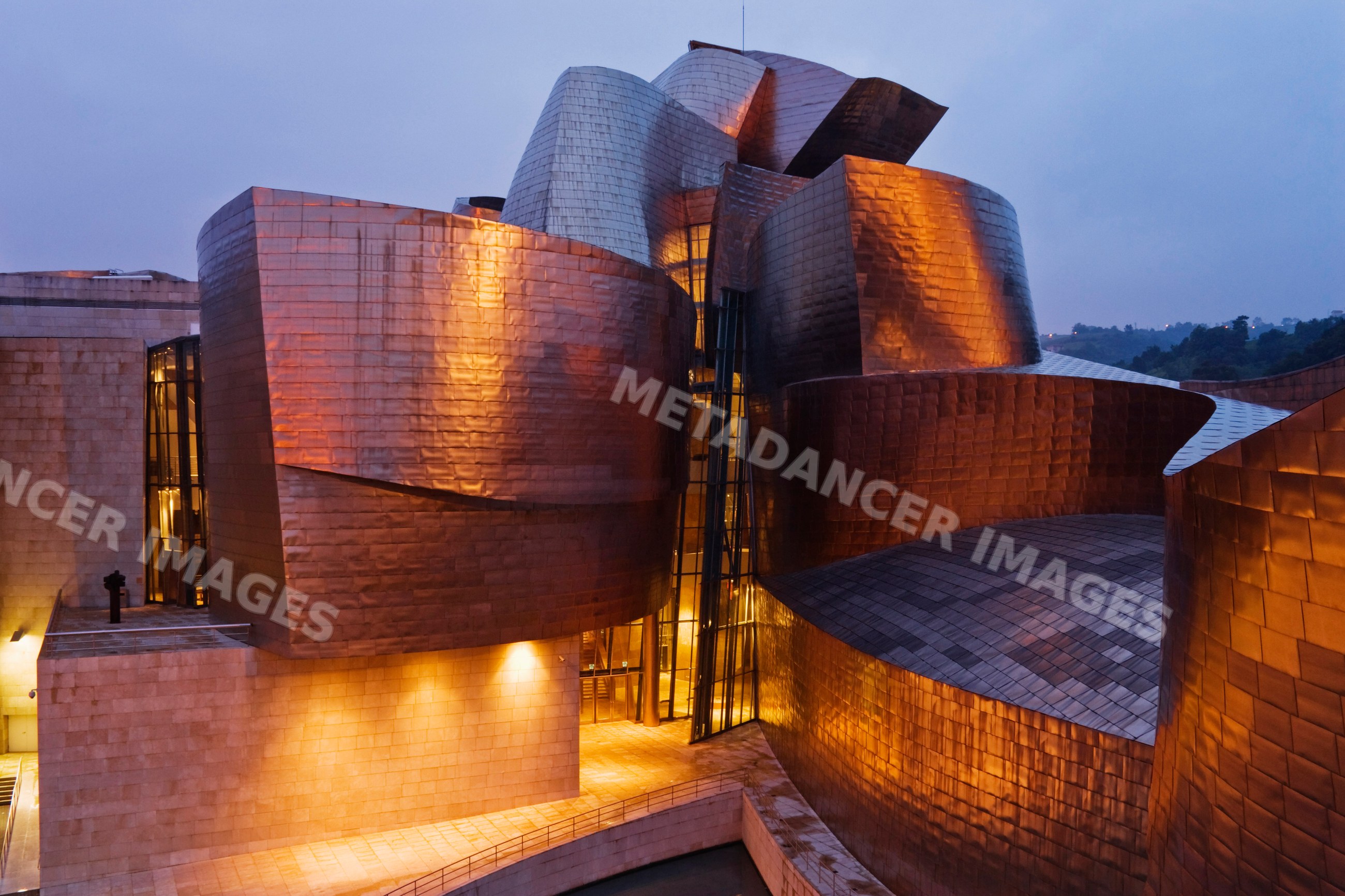 Guggenheim museum with illuminated copper exterior Spain