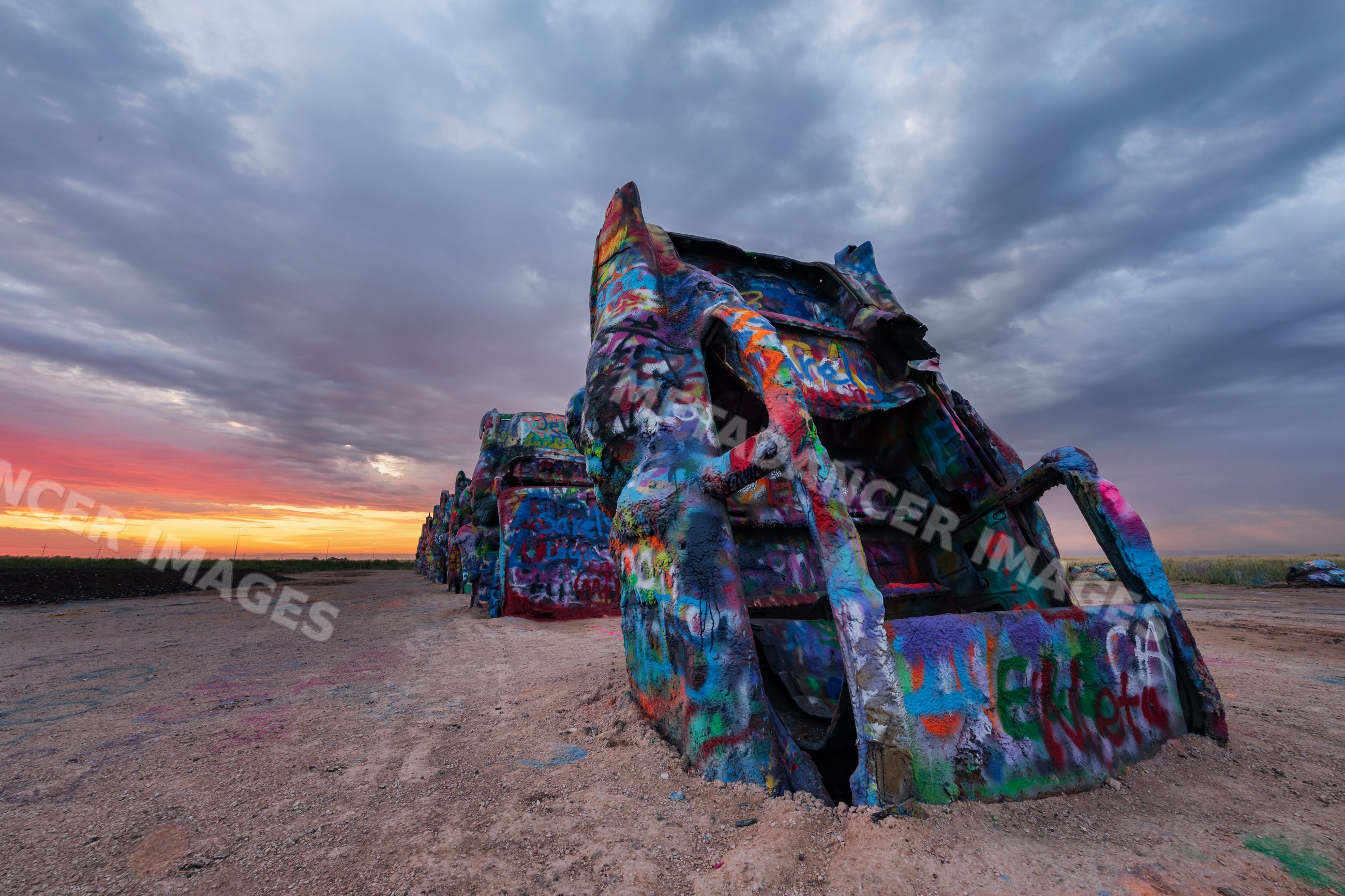 Cadillac Ranch graffiti cars at sunset in amarillo texas