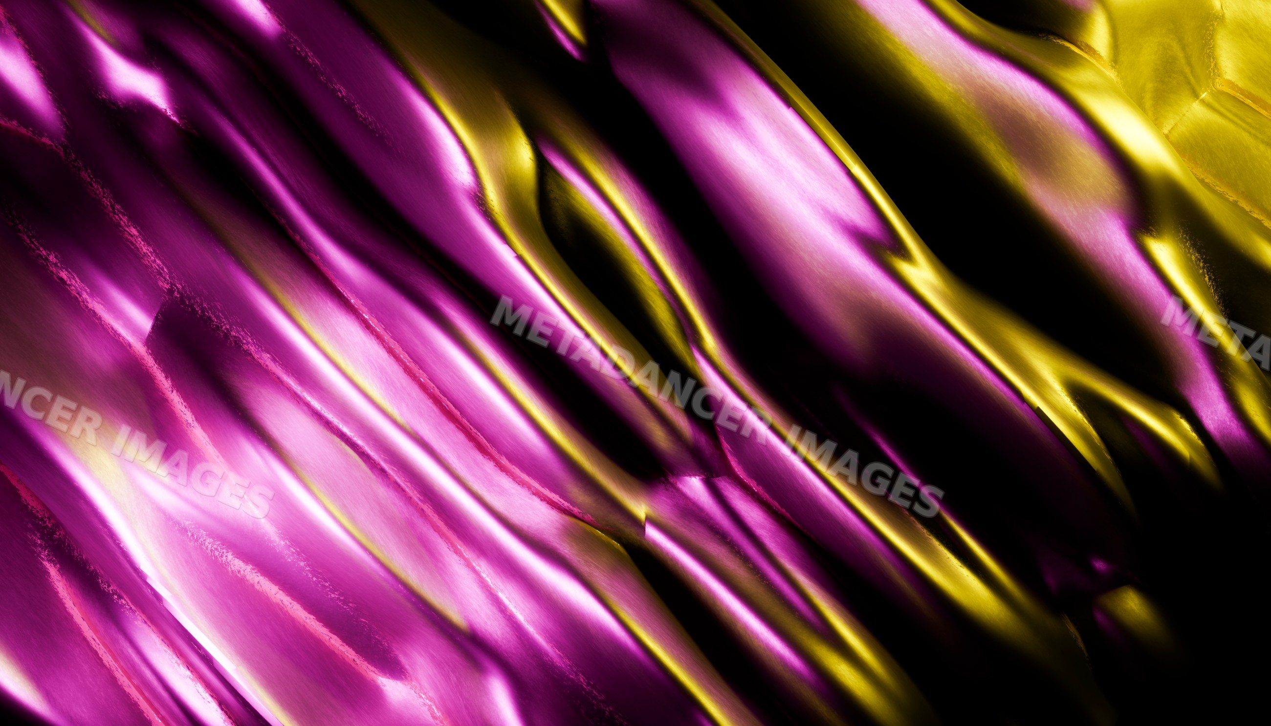 Close-up of shiny abstract purple and gold metallic textured surface