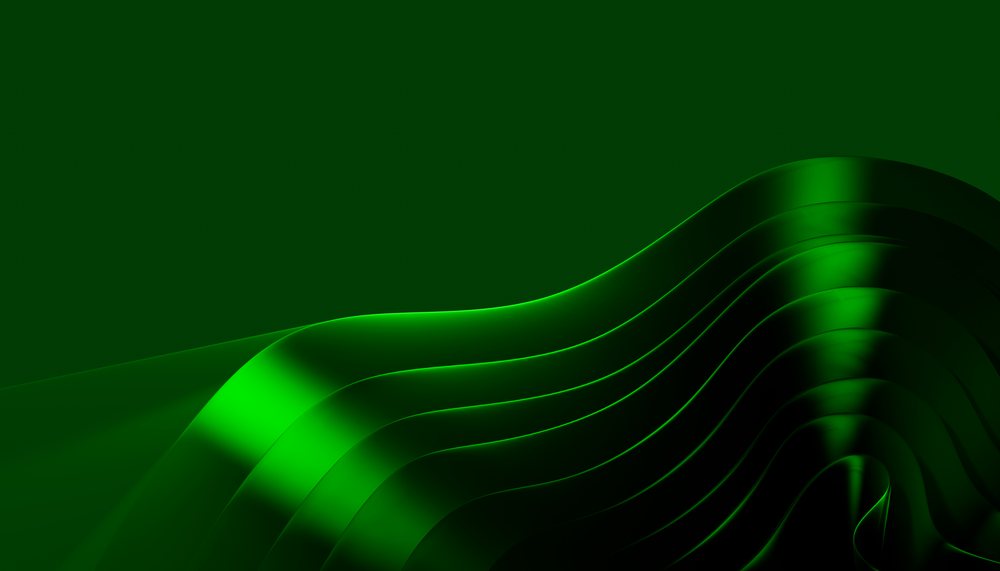 Smooth layered green waves form a modern abstract digital design