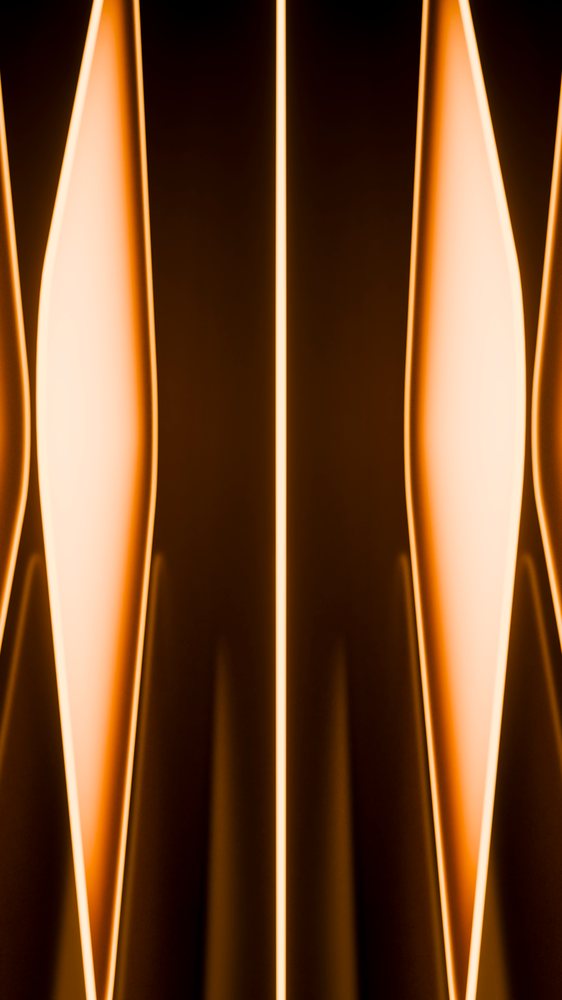 Abstract orange glowing vertical light pattern on dark background