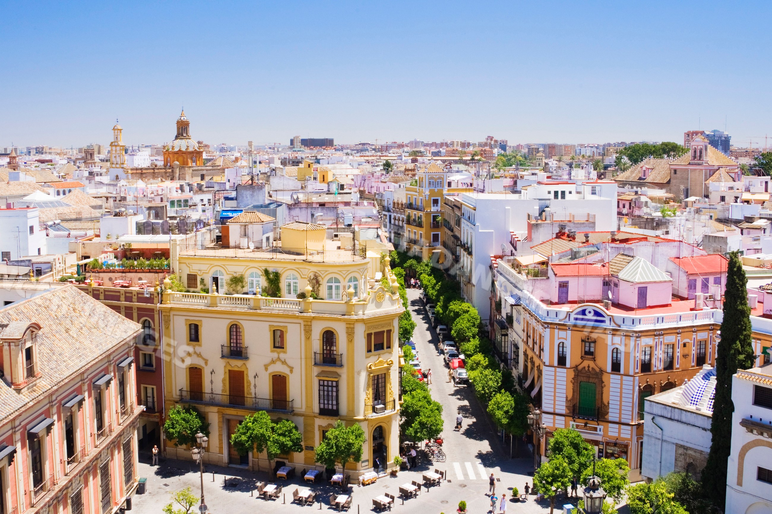 Cityscape view of seville rooftops and street Spain
