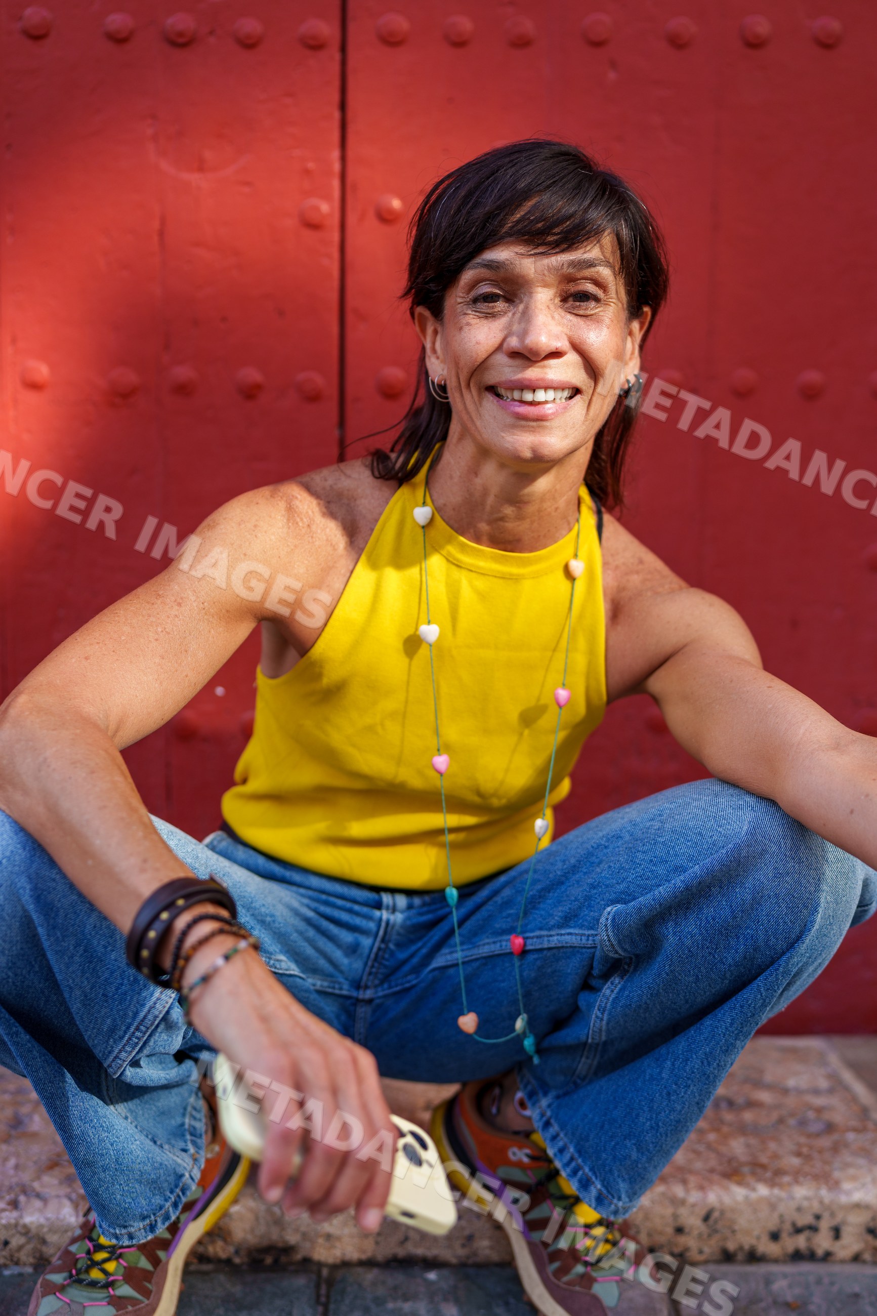 Hispanic woman sitting casually