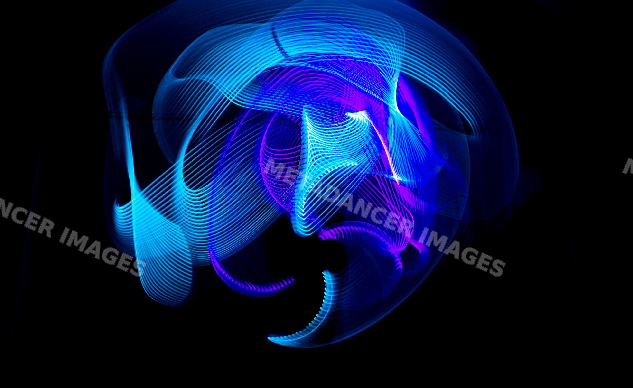 Led light painting with blue and purple glowing abstract patterns