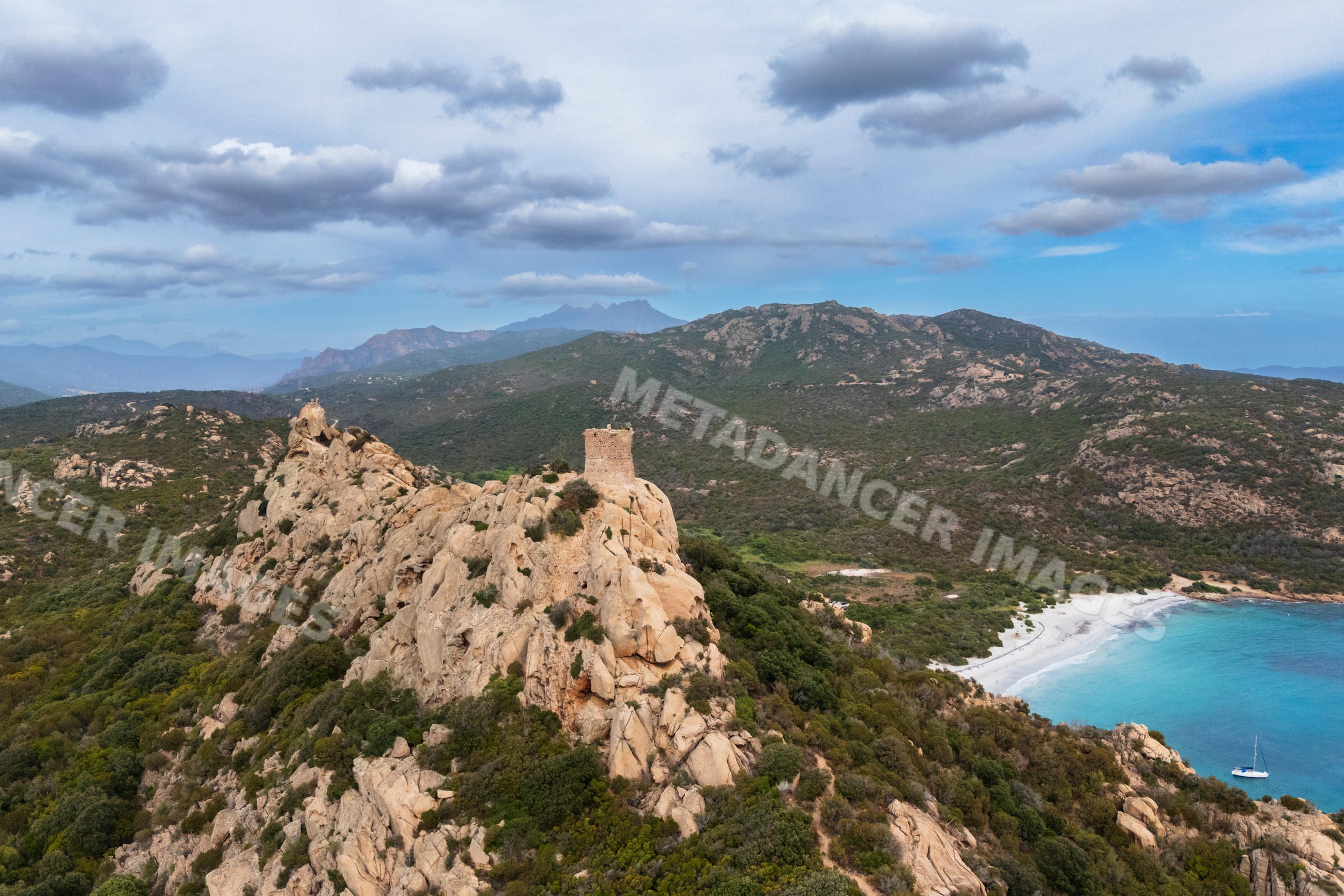 Genoese tower on rocky hill