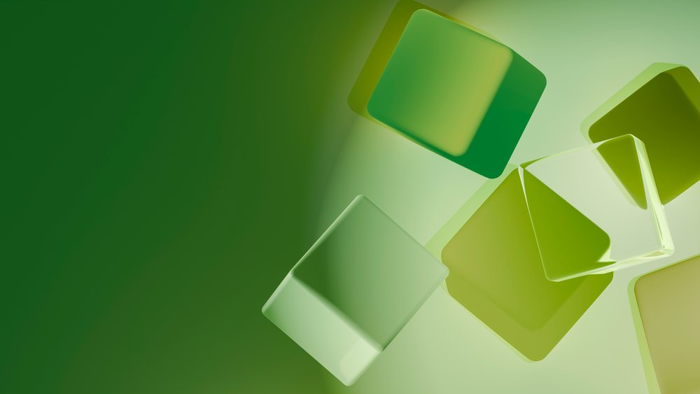 Floating green 3d cubes on gradient green digital background