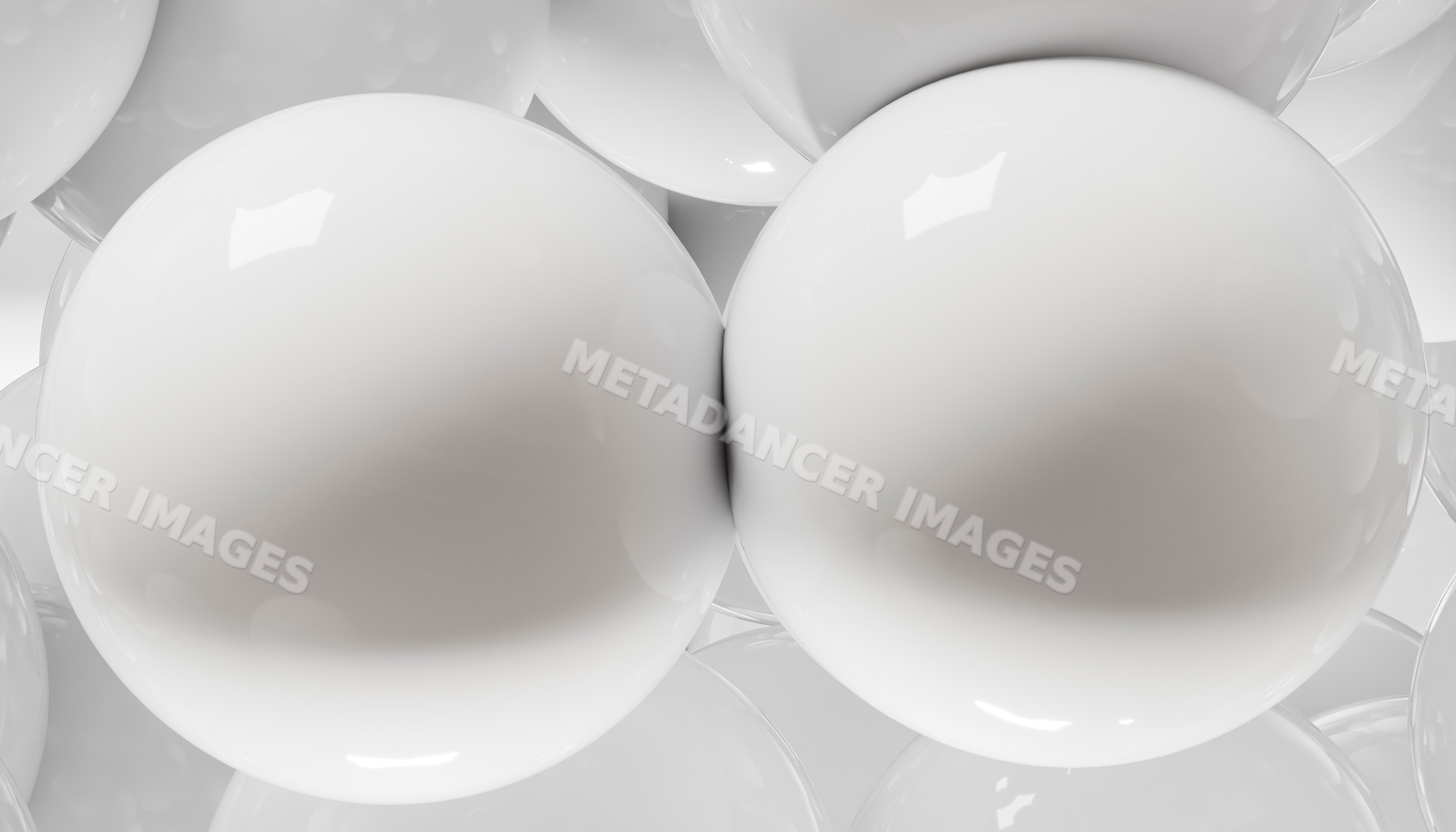Close-up of smooth white glossy spheres clustered