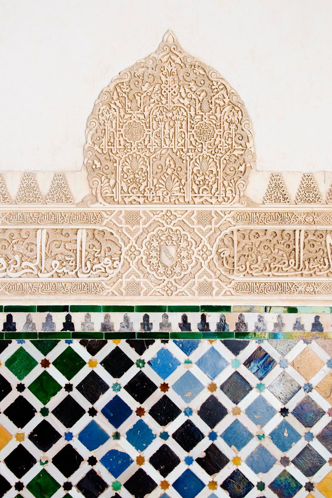 Moorish carving and tilework detail at alhambra palace in granada