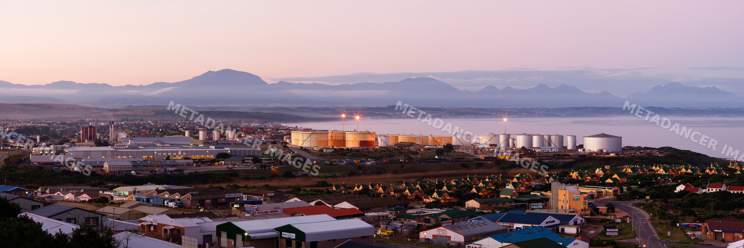 Mossel bay skyline with industrial tanks, south africa