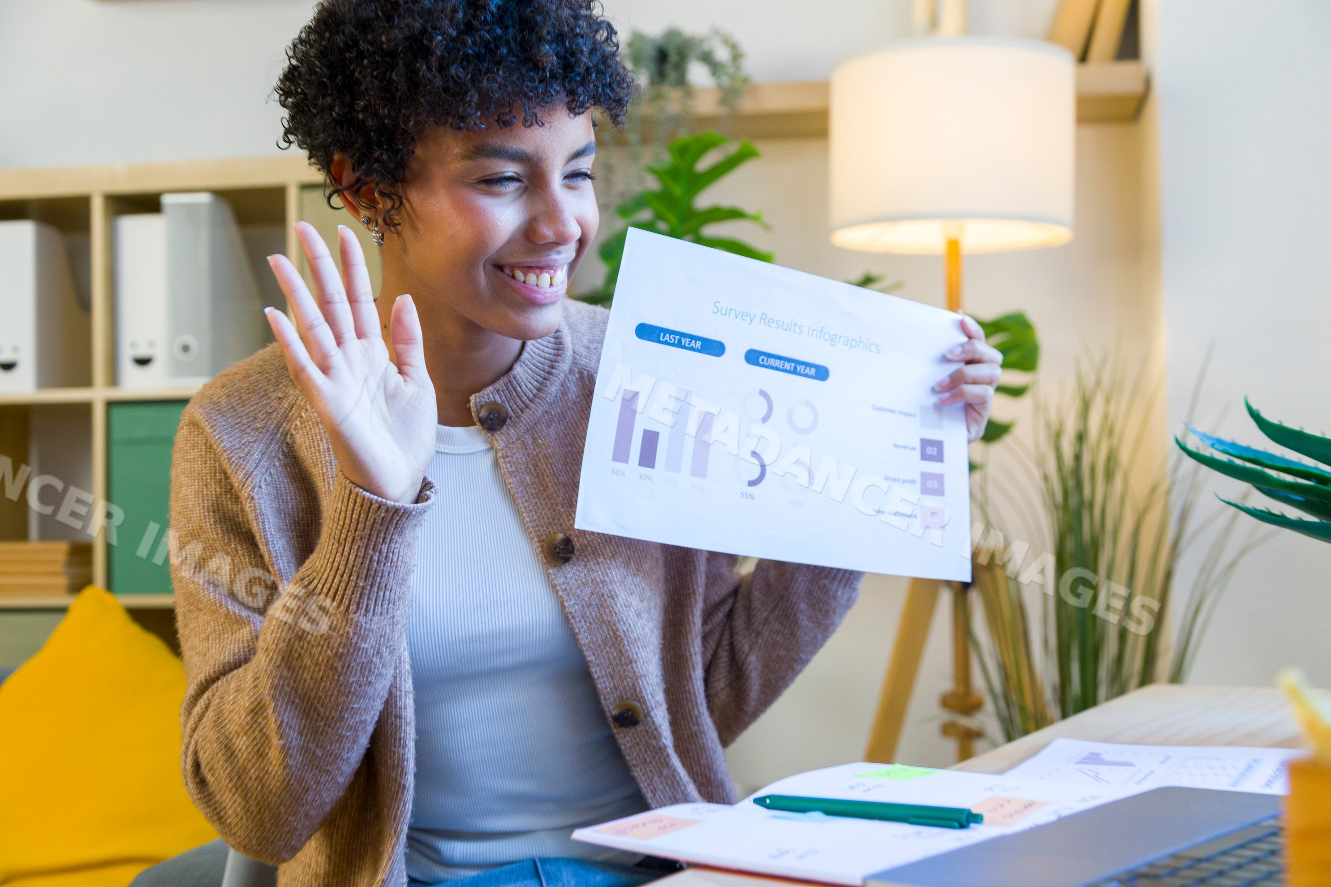 African American woman sharing survey results during remote work