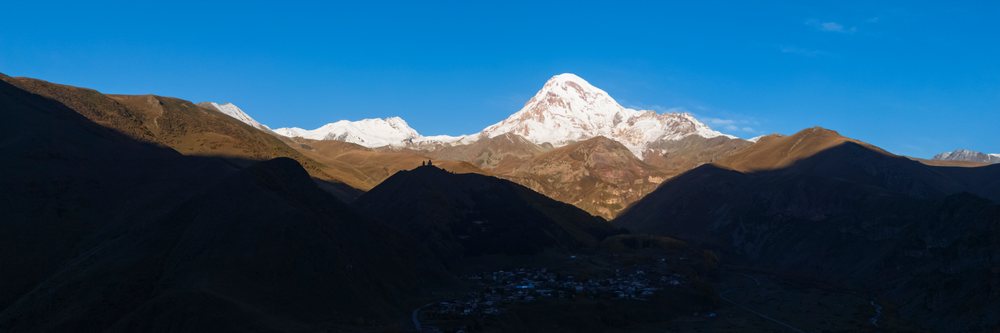Gergeti Trinity Church and Mount Kazbegi in a church