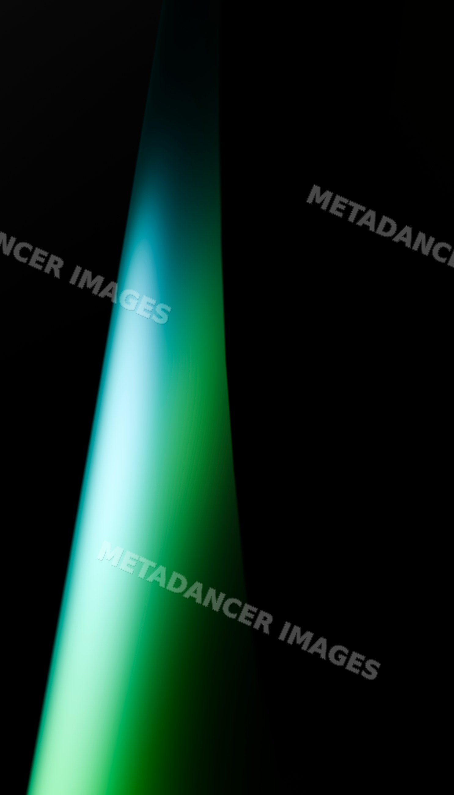 Green and blue gradient light beam against dark background