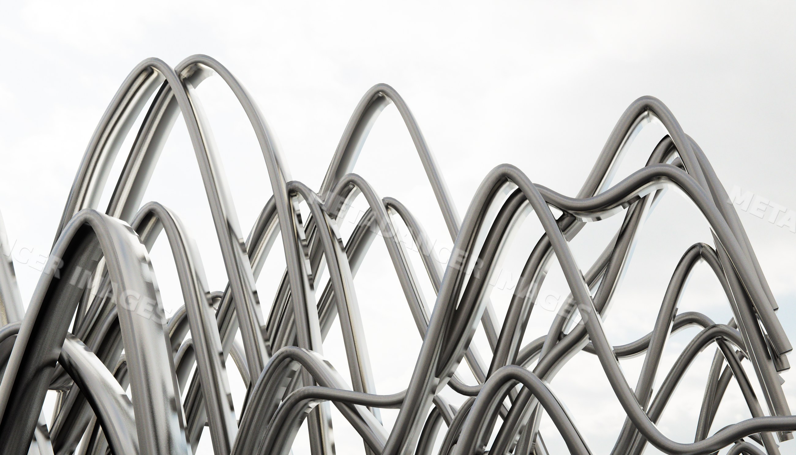 Abstract metal sculpture of curved steel tubes creating interwoven