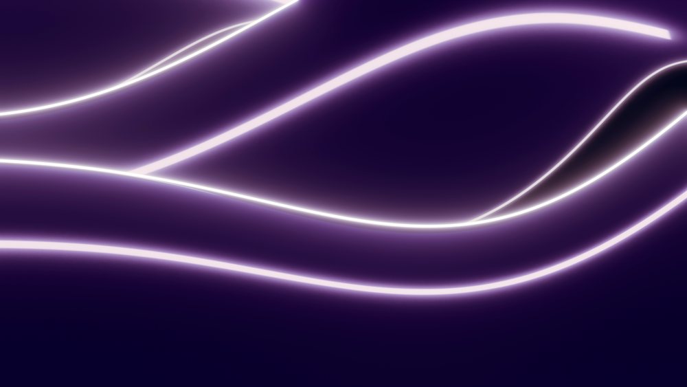Abstract glowing light trails on dark purple background