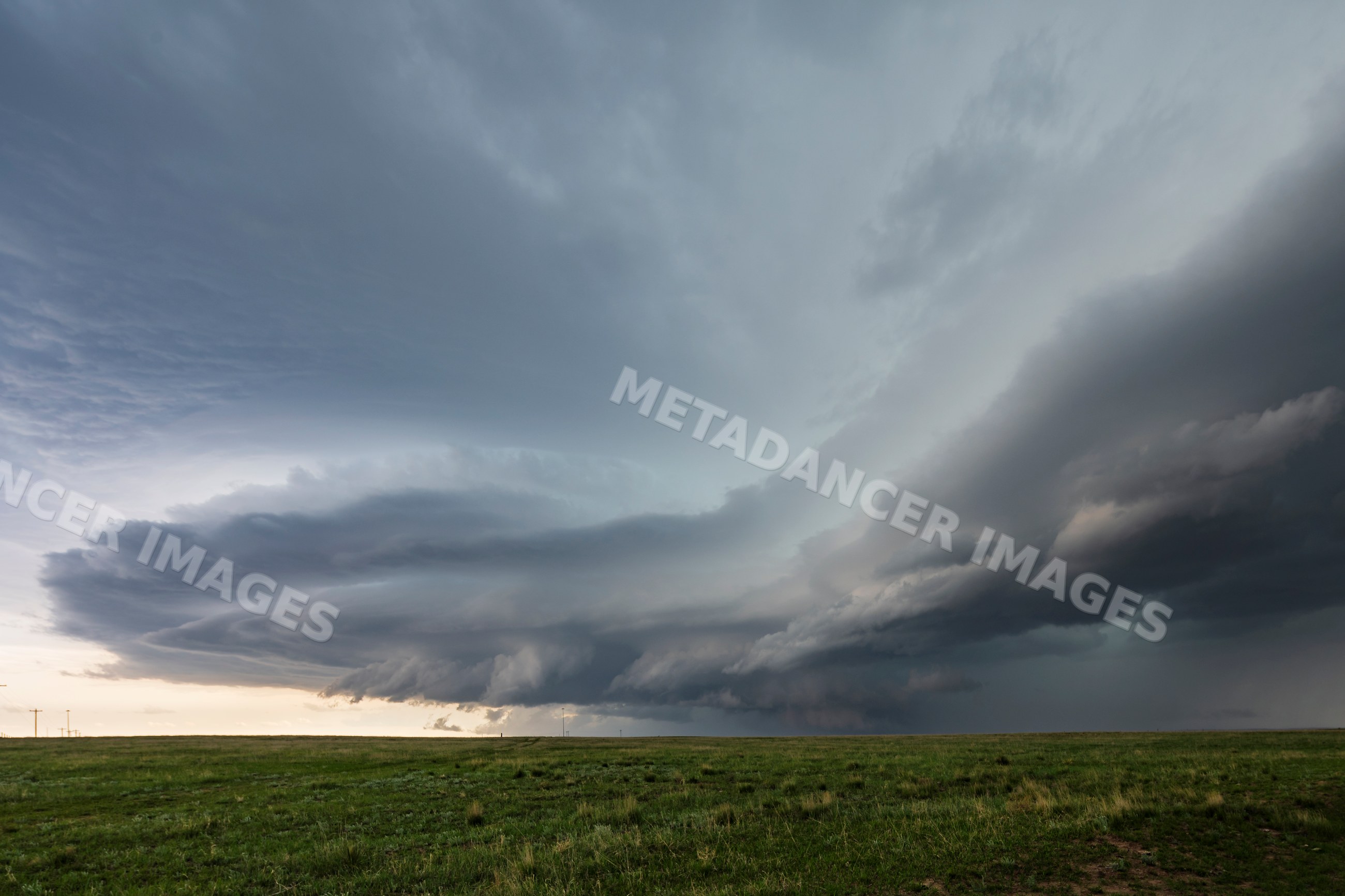Supercell storm forming over grassy plain near pine bluffs wyoming USA