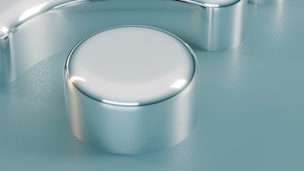 Close-up of reflective cylindrical metallic object with smooth surface