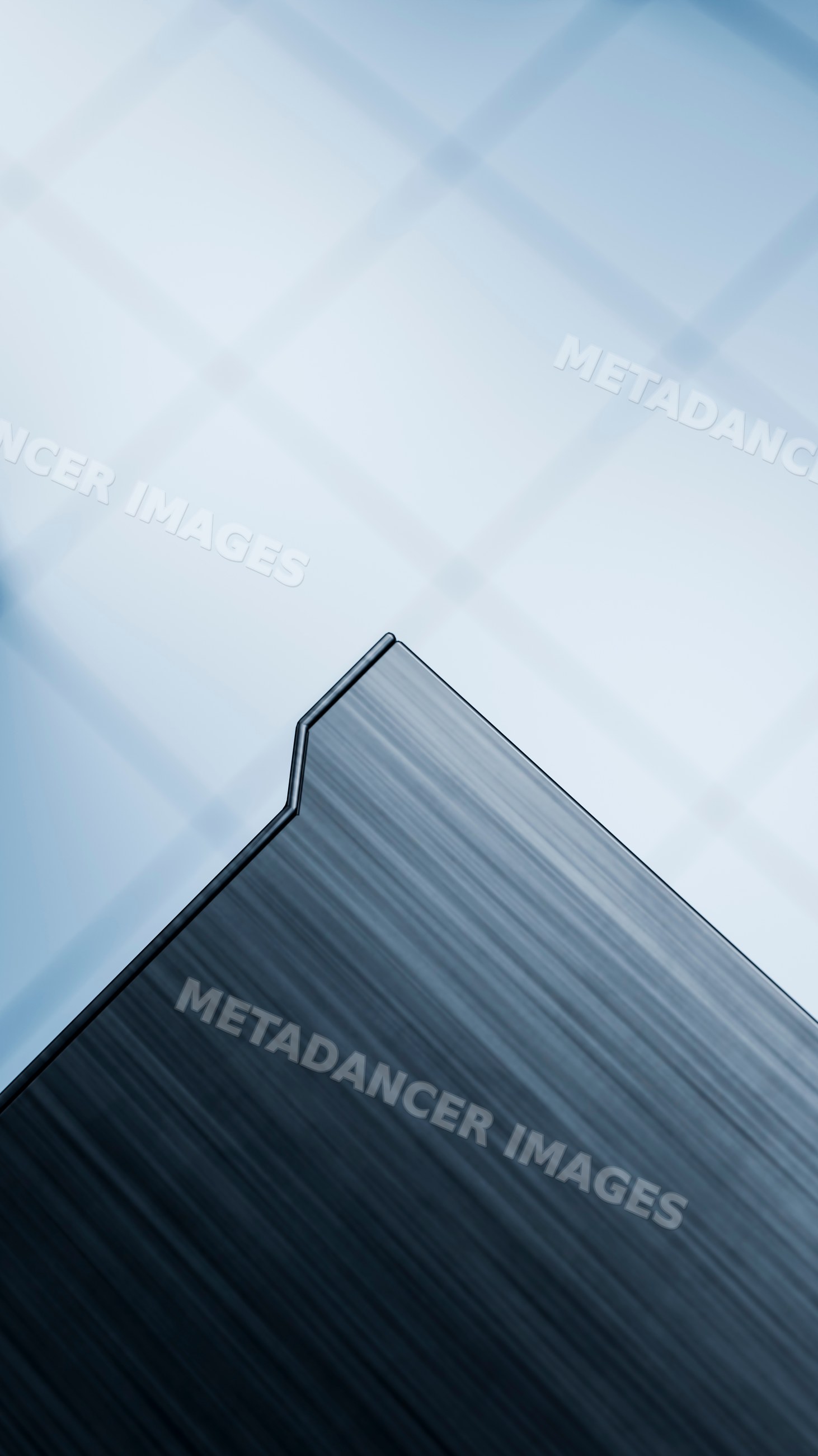 Brushed metal corner with sharp edge in modern industrial design