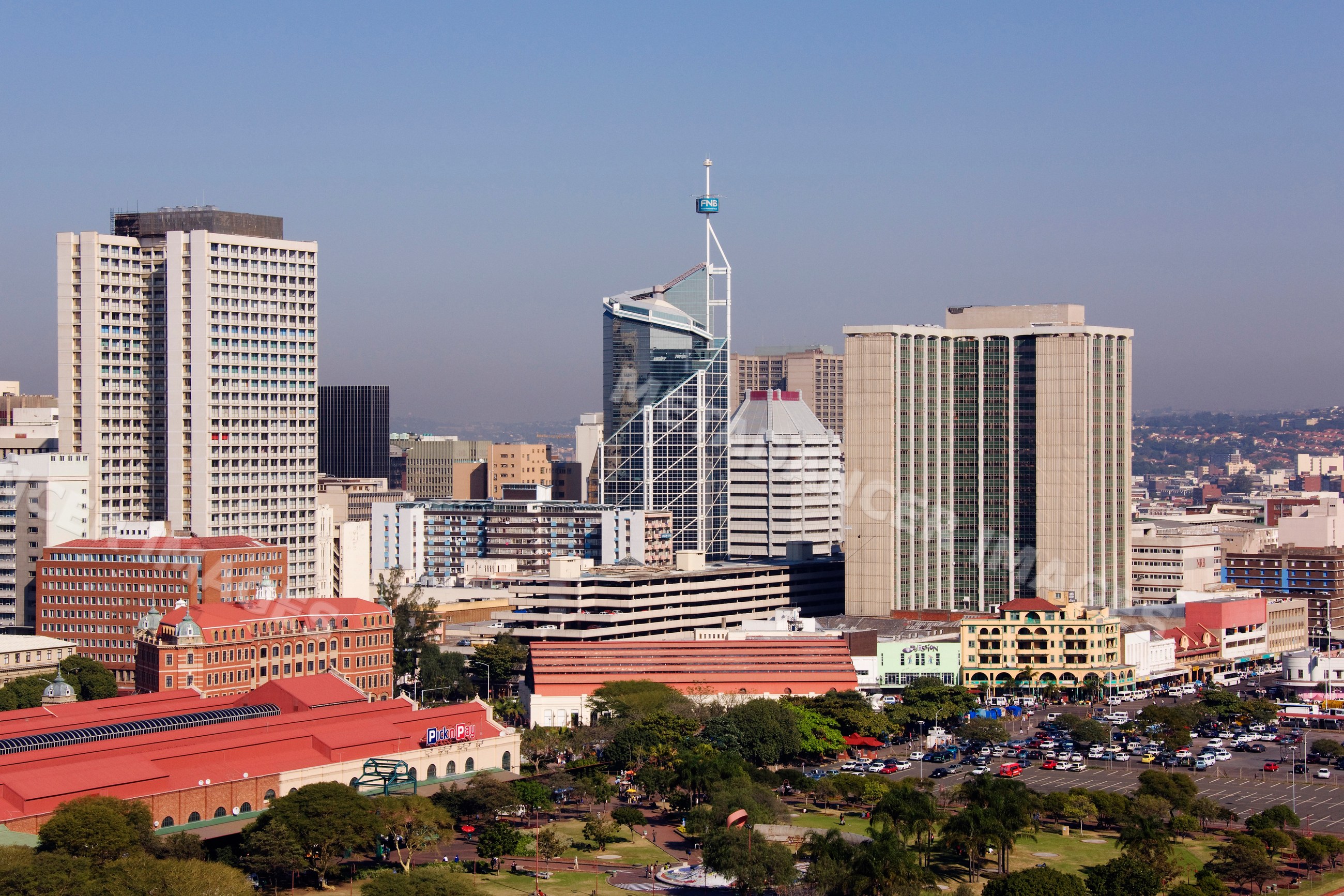 Durban skyline with city buildings and urban park south africa