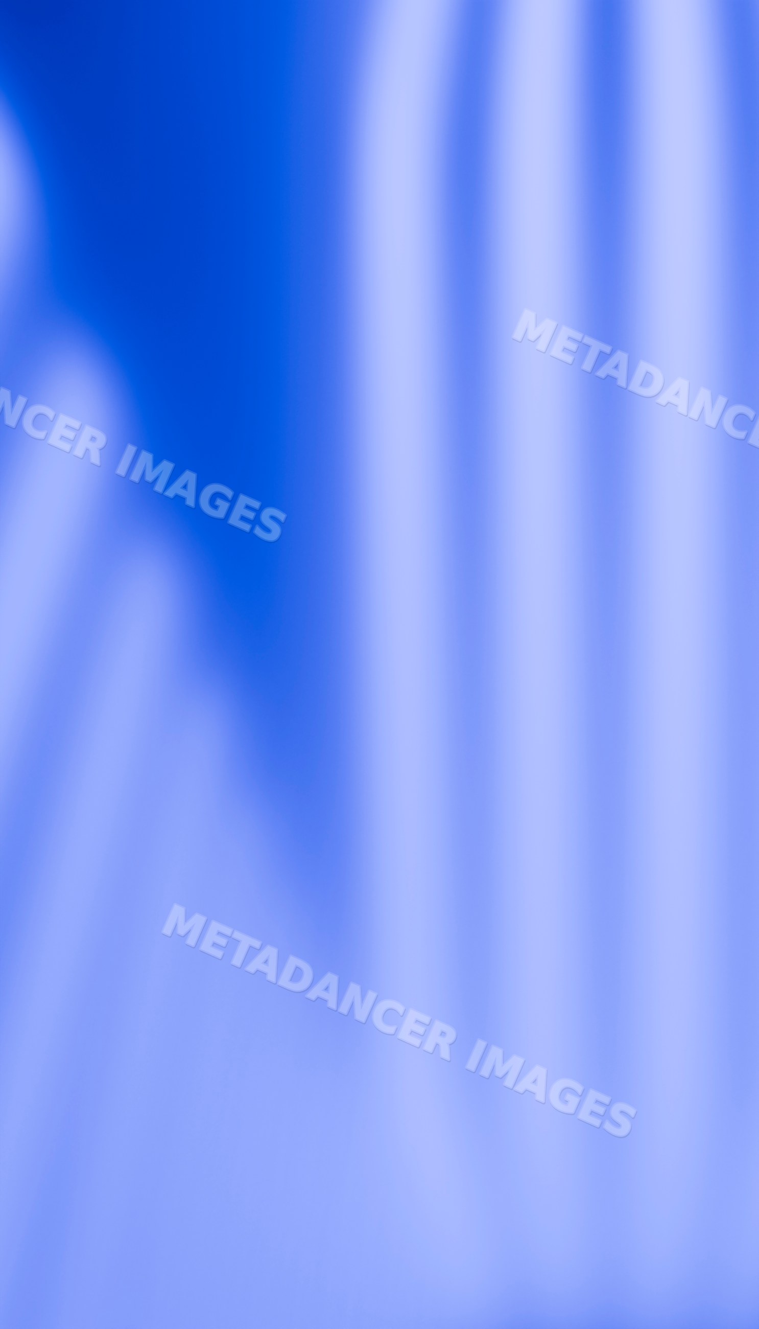 Abstract blue gradient background with soft vertical light streaks