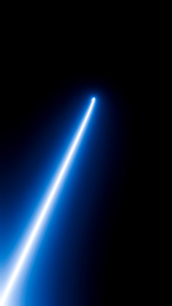 Blue glowing light streak with radiant trail on dark background