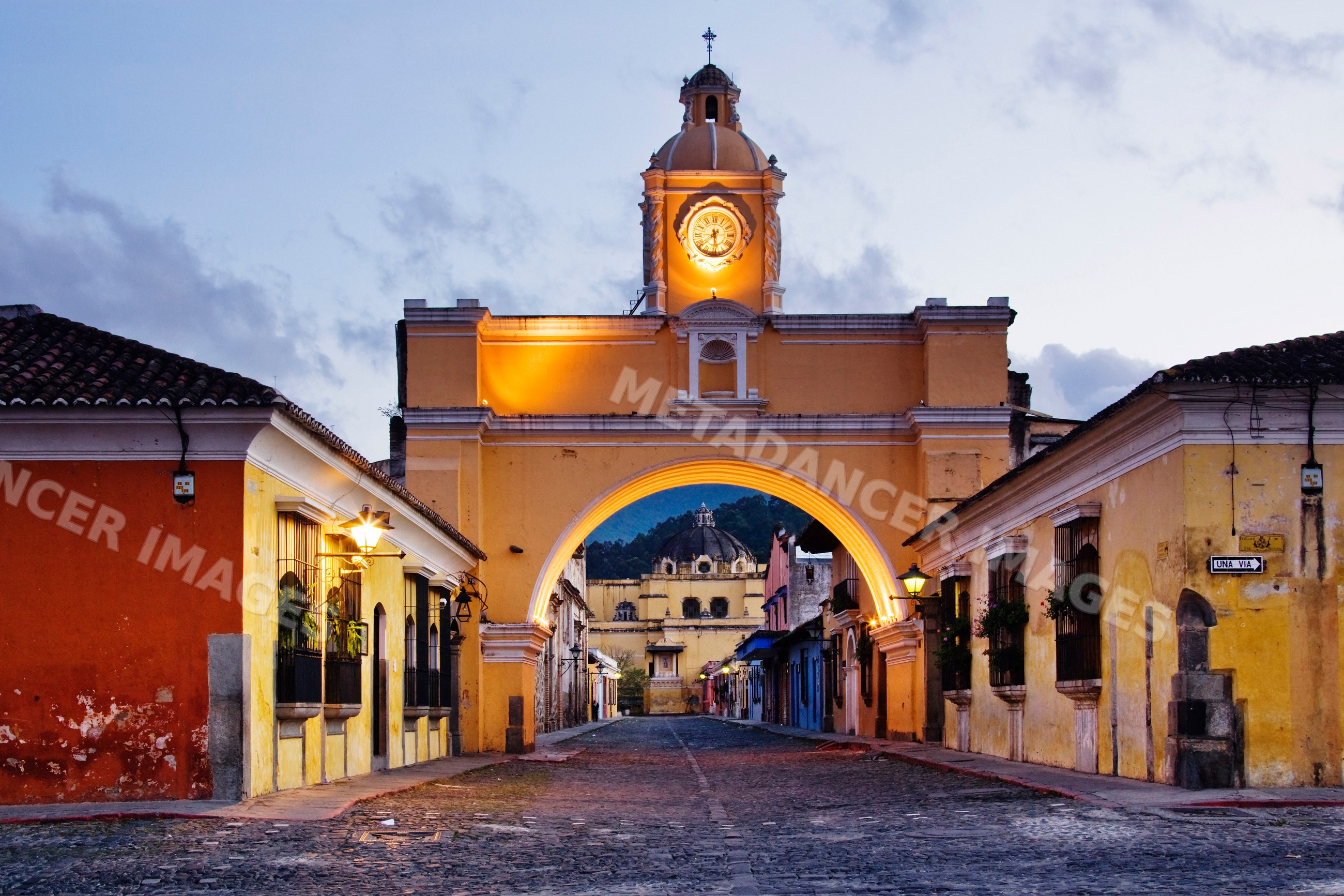 Santa catarina arch with illuminated clock tower