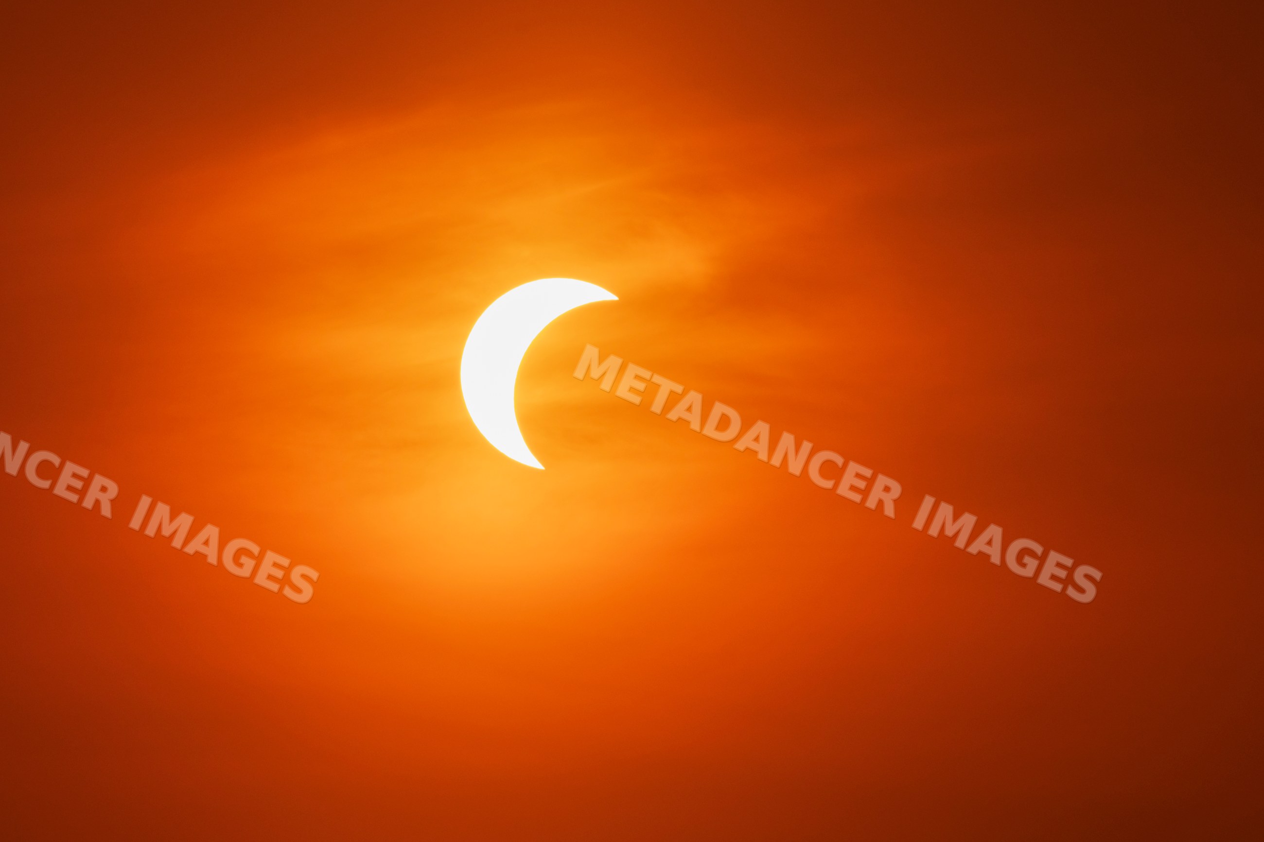 Partial solar eclipse over valldemossa, Mallorca, Spain