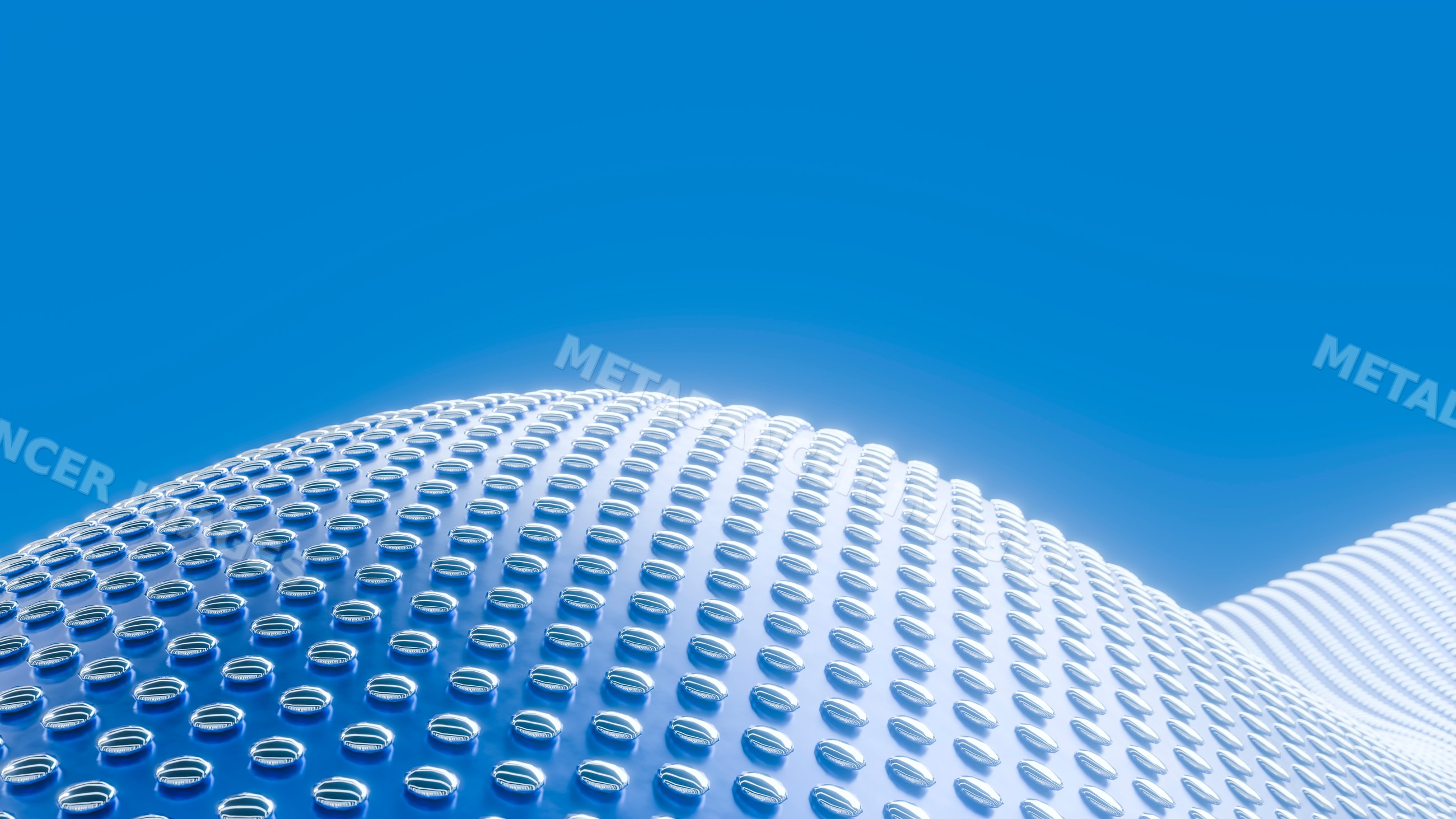Wavy surface with glass marbles reflecting blue sky