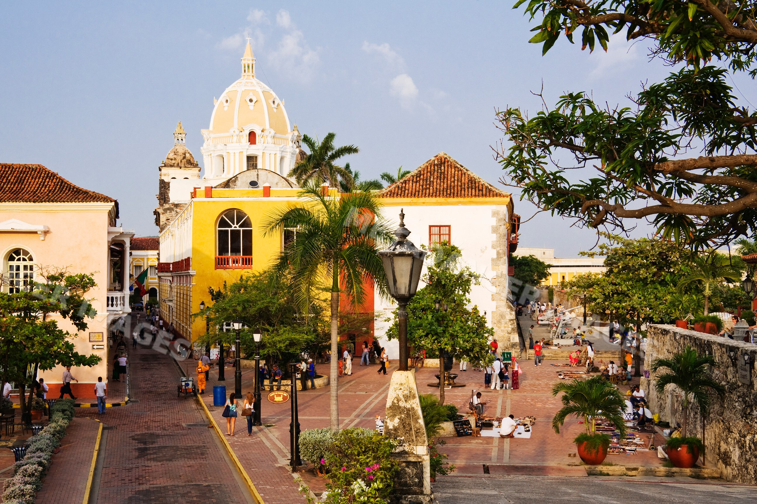 Street plaza scene with historic colonial buildings, colombia