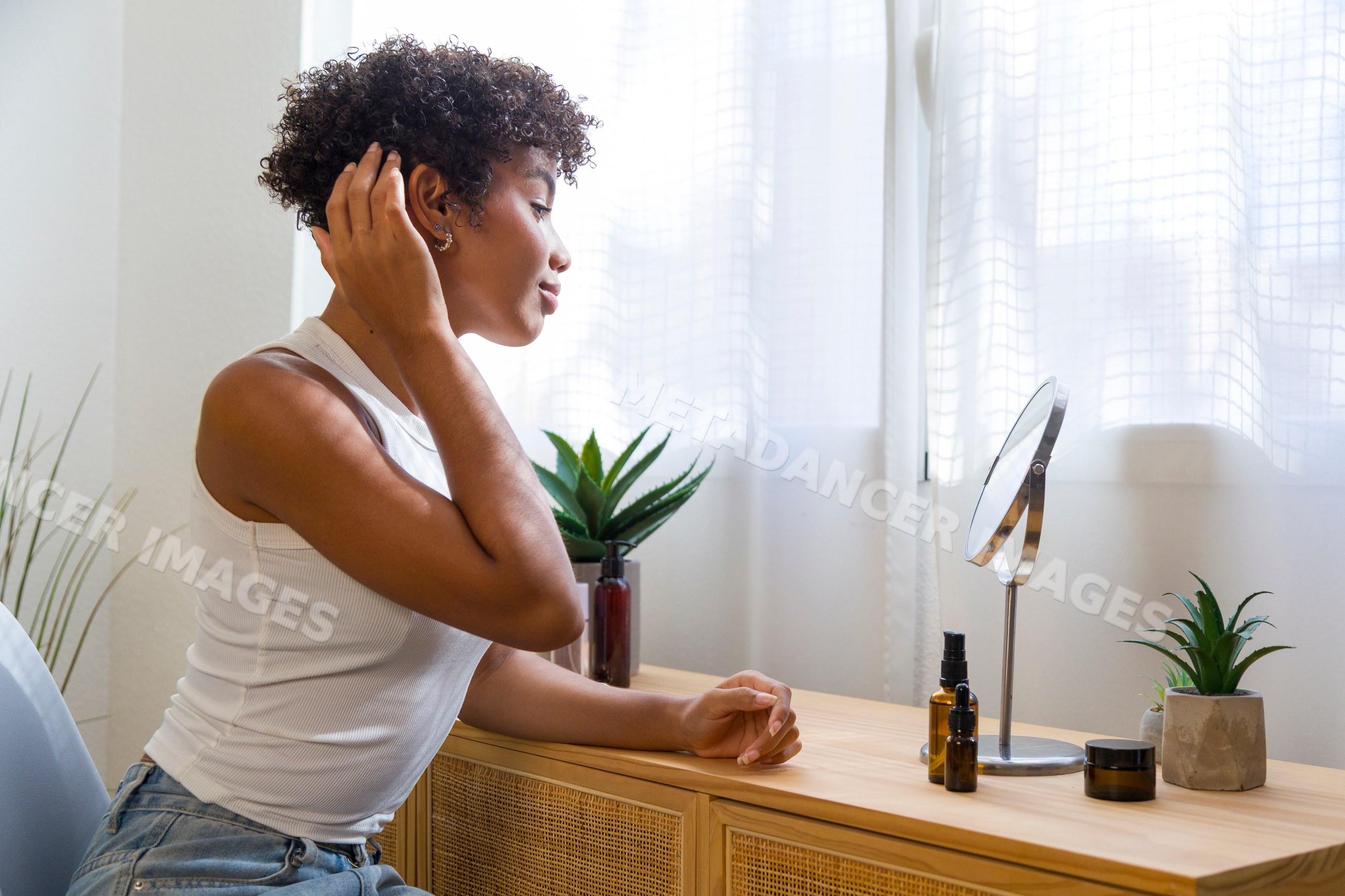 Young African American woman grooming