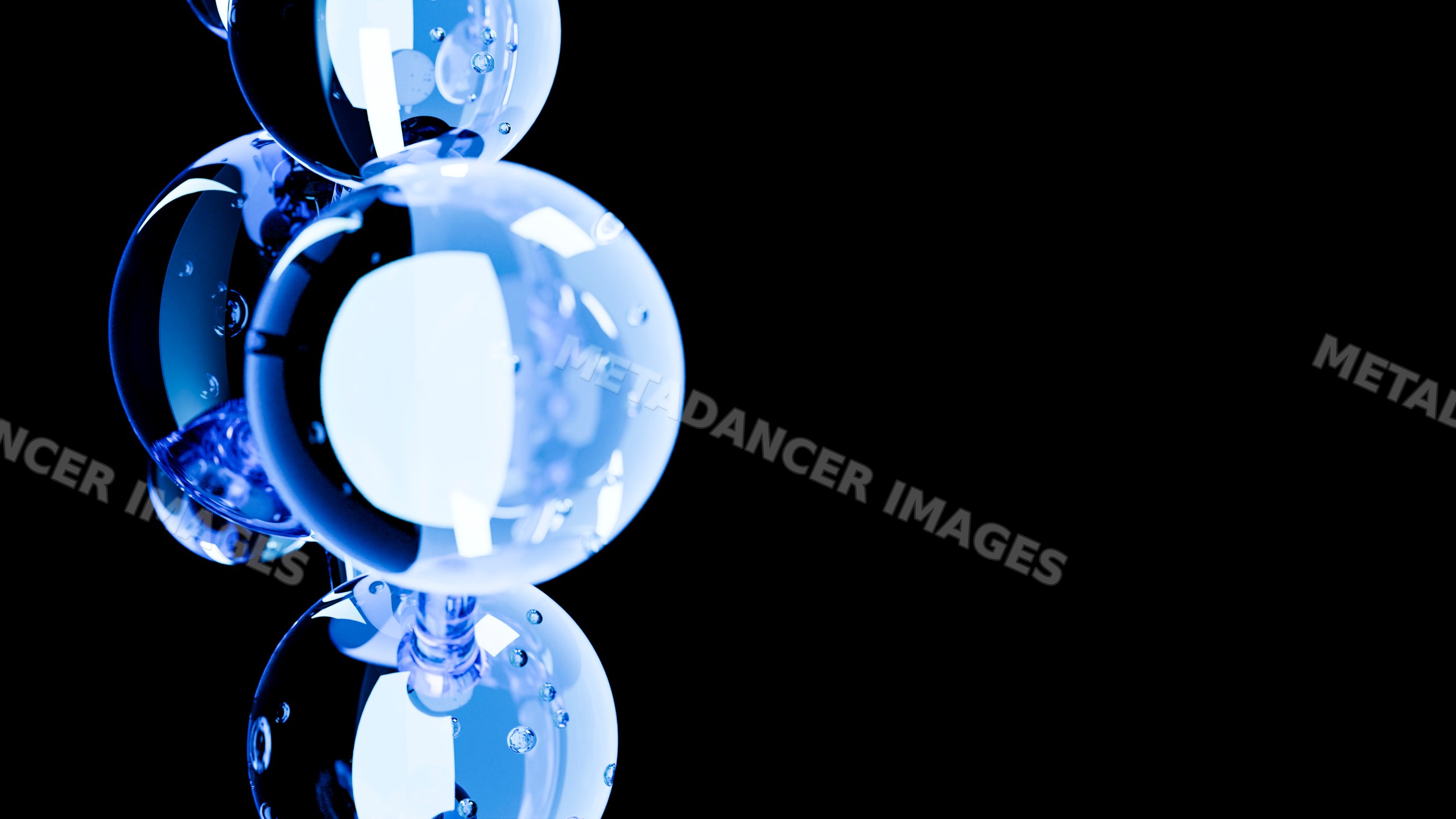 Close-up view of glowing blue transparent bubbles cluster