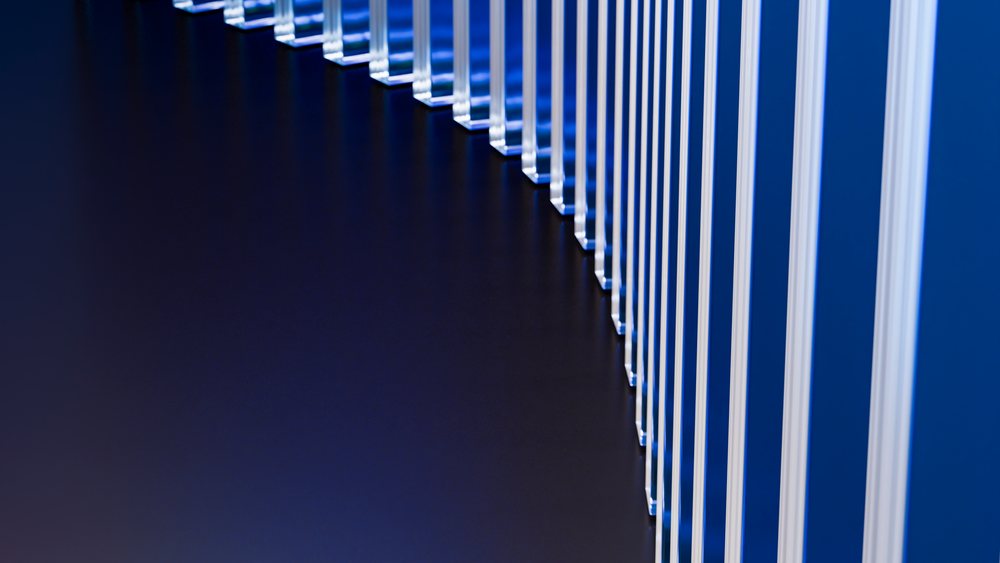 Abstract blue vertical panels with symmetrical stripes and reflections